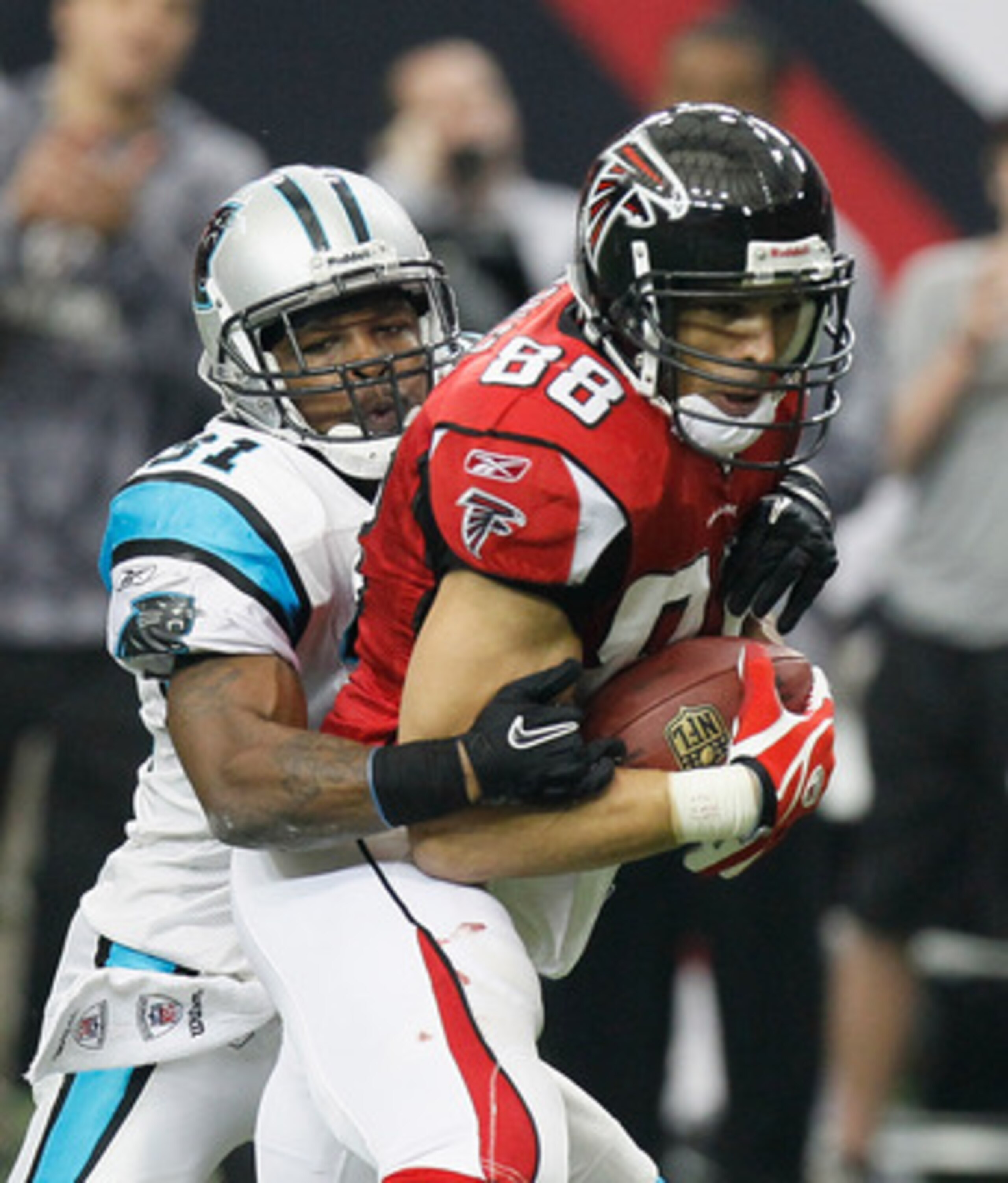 ATLANTA, GA - JANUARY 02: Tony Gonzalez #88 of the Atlanta Falcons against Richard Marshall #31 of the Carolina Panthers at Georgia Dome on January 2, 2011 in Atlanta, Georgia. (Photo by Kevin C. Cox/Getty Images) ATLANTA, GA - JANUARY 02: Tony Gonzalez #88 of the Atlanta Falcons against Richard Marshall #31 of the Carolina Panthers at Georgia Dome on January 2, 2011 in Atlanta, Georgia. (Photo by Kevin C. Cox/Getty Images)