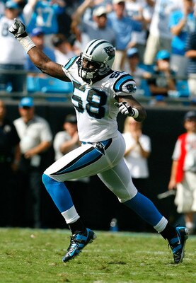 CHARLOTTE, NC - SEPTEMBER 14:  Linebacker Thomas Davis #58 of the Carolina Panthers celebrates a fourth down stop in the final minutes of their 20-17 win over the Chicago Bears at Bank of America Stadium on September 14, 2008 in Charlotte, North Carolina.