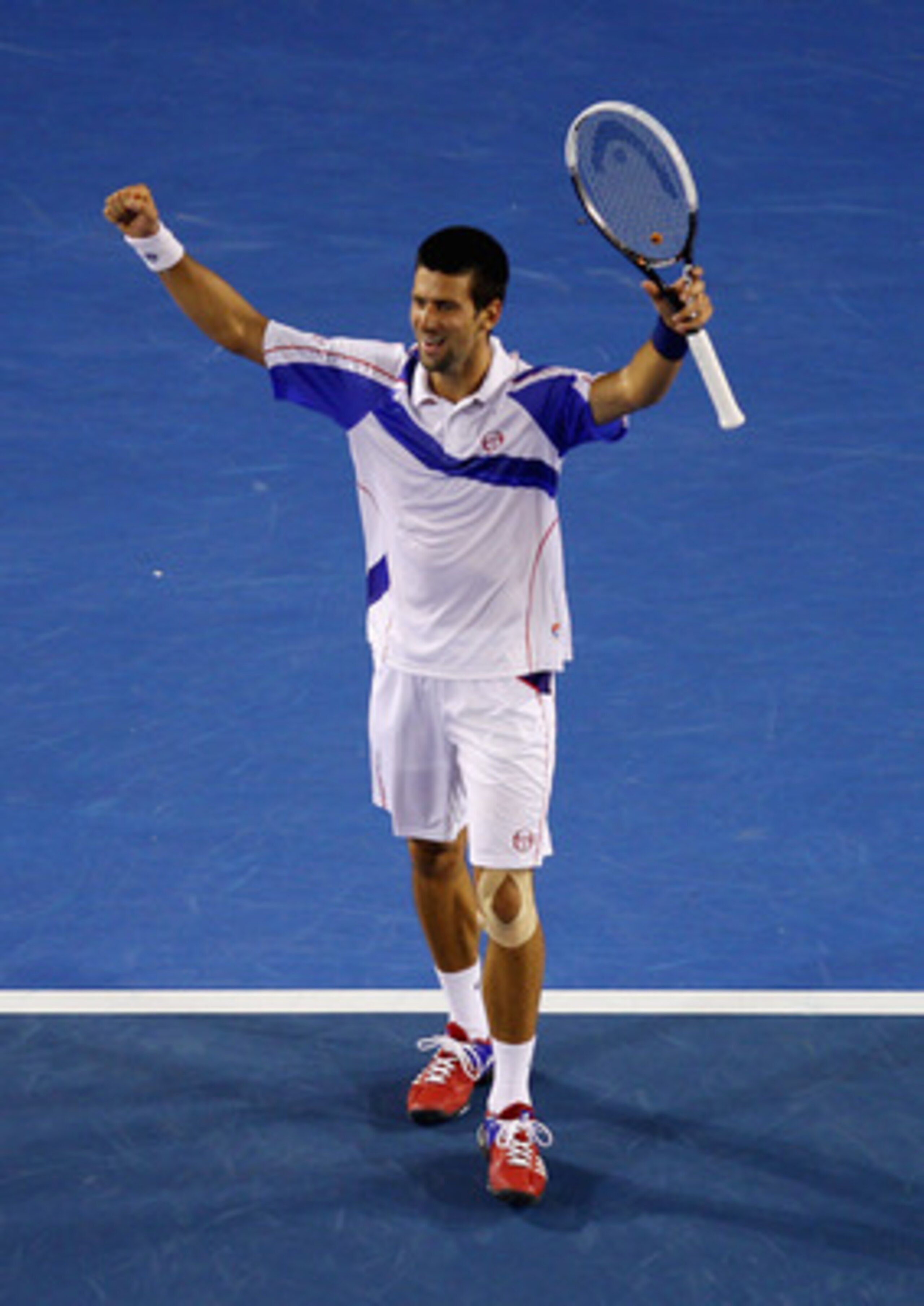 MELBOURNE, AUSTRALIA - JANUARY 30:  Novak Djokovic of Serbia celebrates championship point in his men's final match against Andy Murray of Great Britain during day fourteen of the 2011 Australian Open at Melbourne Park on January 30, 2011 in Melbourne, Au