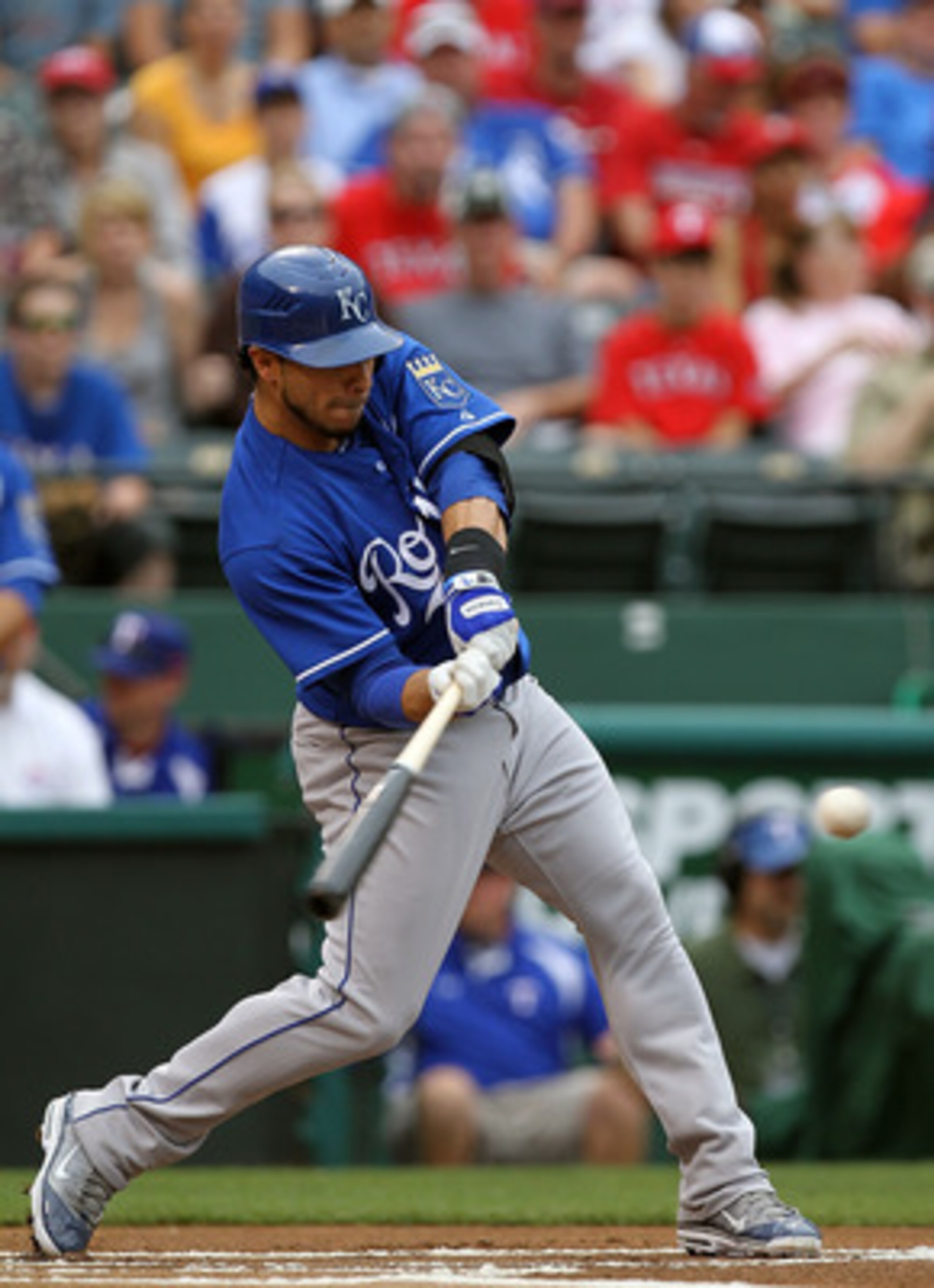 ARLINGTON, TX - APRIL 24: Mike Aviles #13 of the Kansas City Royals hits a single against the Texas Rangers at Rangers Ballpark in Arlington on April 24, 2011 in Arlington, Texas. (Photo by Ronald Martinez/Getty Images) ARLINGTON, TX - APRIL 24: Mike Aviles #13 of the Kansas City Royals hits a single against the Texas Rangers at Rangers Ballpark in Arlington on April 24, 2011 in Arlington, Texas. (Photo by Ronald Martinez/Getty Images)