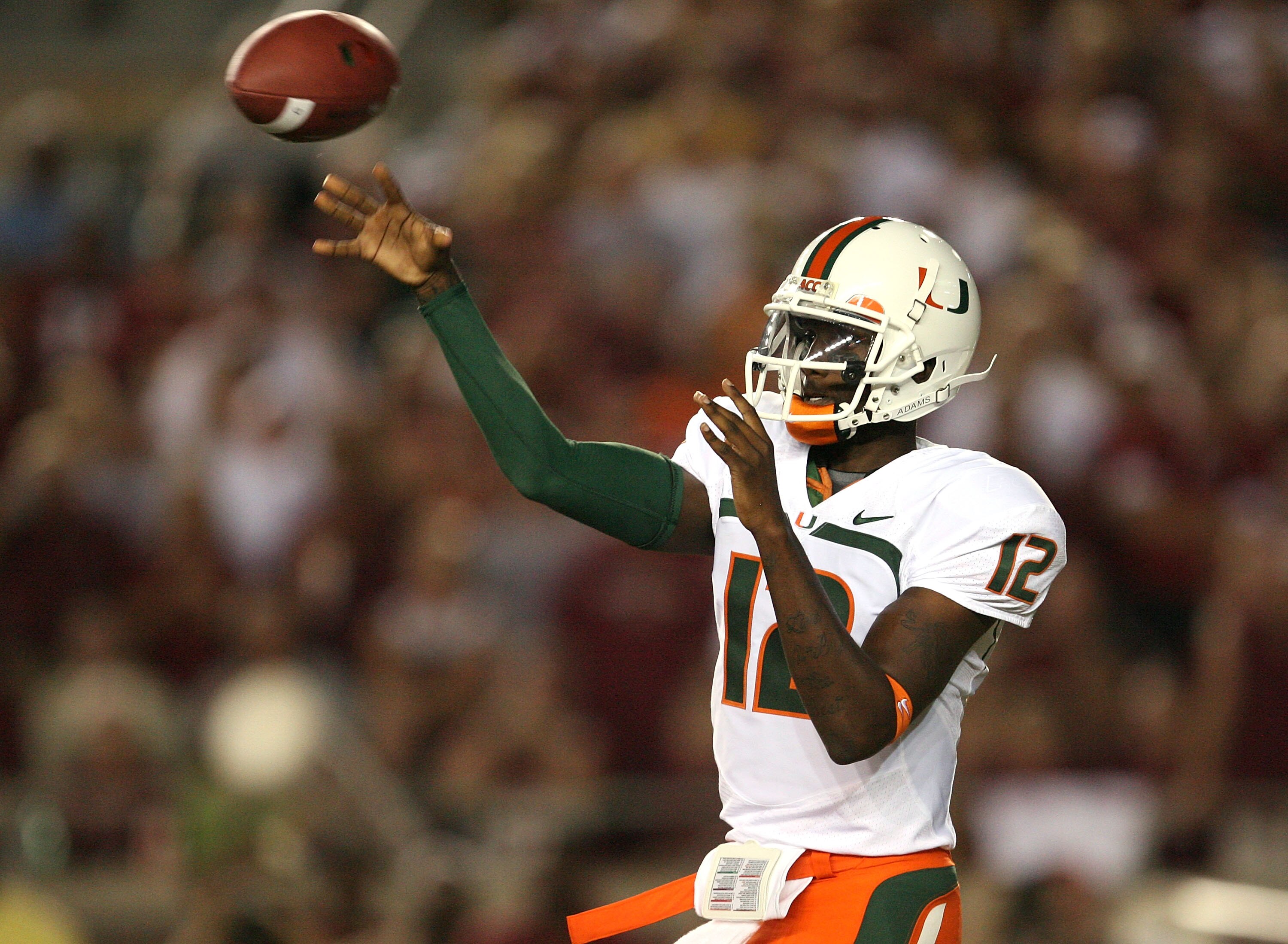 TALLAHASSEE, FL - SEPTEMBER 07:  Quarterback Jacory Harris #12 of the Miami Hurricanes throws a pass against the Florida State Seminoles at Doak Campbell Stadium on September 7, 2009 in Tallahassee, Florida.  (Photo by Doug Benc/Getty Images)