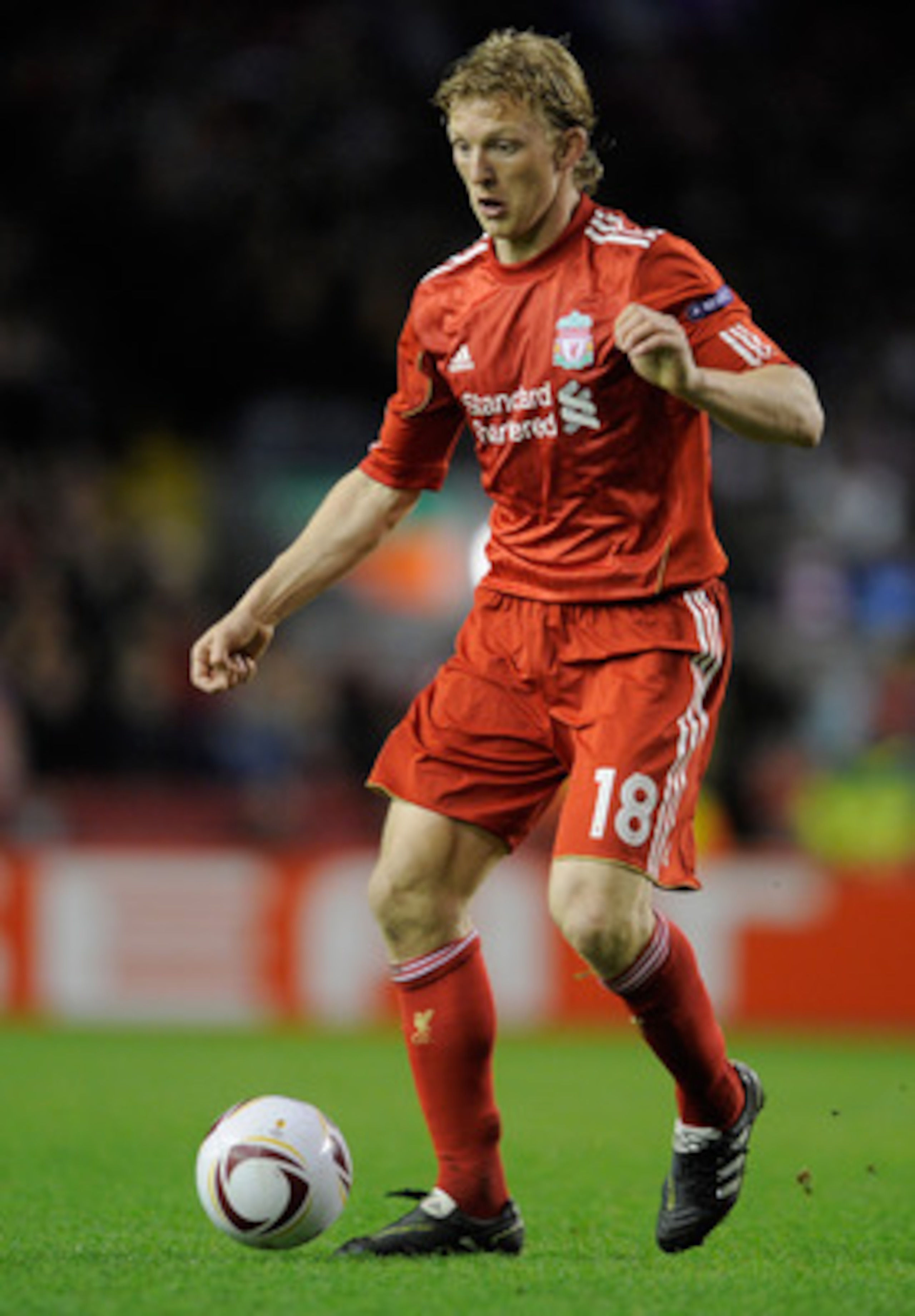 LIVERPOOL, ENGLAND - MARCH 17:  Dirk Kuyt of Liverpool runs with the ball during the UEFA Europa League Round of 16 second leg match between Liverpool and SC Braga at Anfield on March 17, 2011 in Liverpool, England.  (Photo by Michael Regan/Getty Images)