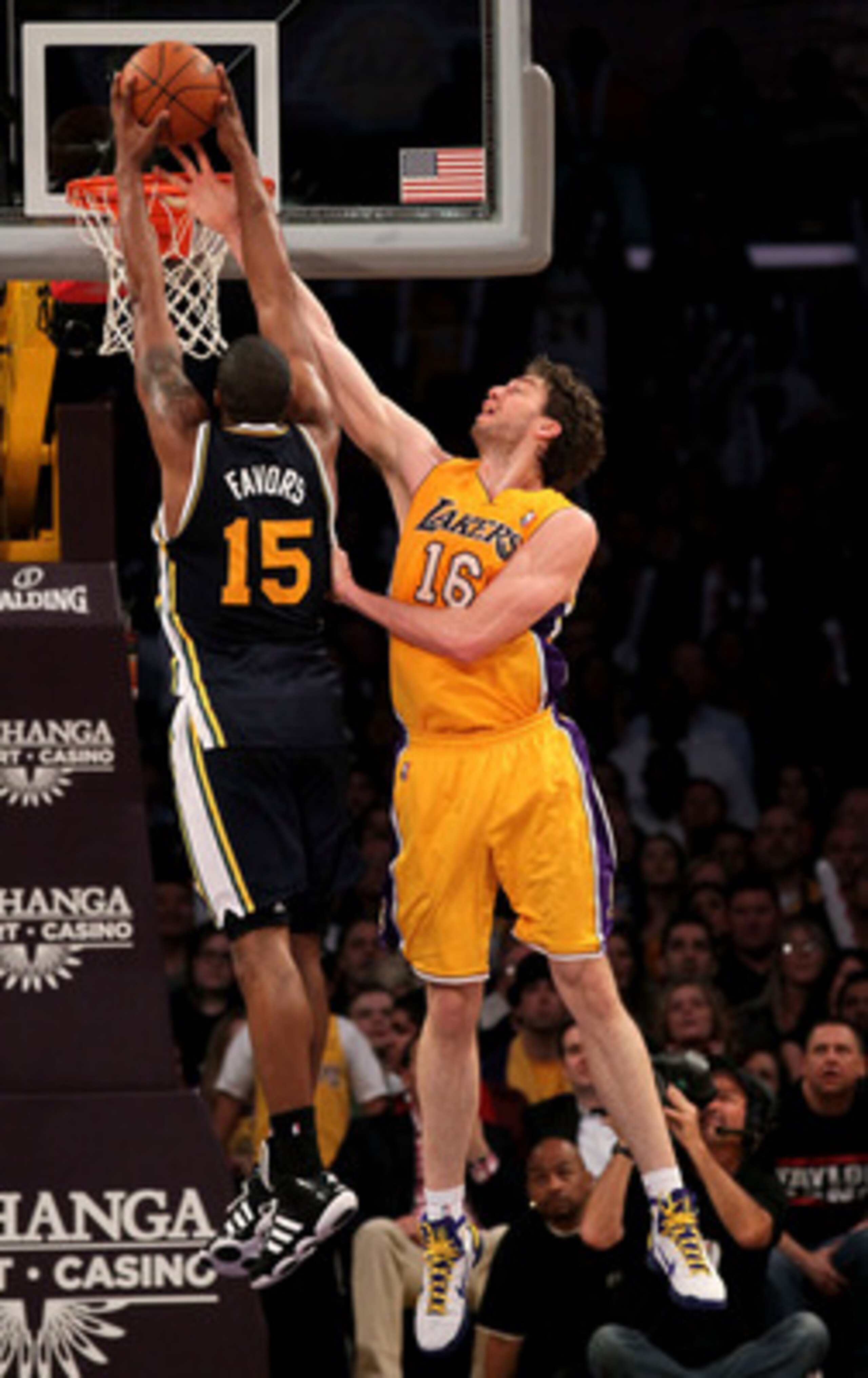 LOS ANGELES, CA - APRIL 05: Pau Gasol #16 of the Los Angeles Lakers blocks a shot by Derrick Favors #15 of the Utah Jazz at Staples Center on April 5, 2011 in Los Angeles, California. The Jazz won 86-85. NOTE TO USER: User expressly acknowledges and agr LOS ANGELES, CA - APRIL 05: Pau Gasol #16 of the Los Angeles Lakers blocks a shot by Derrick Favors #15 of the Utah Jazz at Staples Center on April 5, 2011 in Los Angeles, California. The Jazz won 86-85. NOTE TO USER: User expressly acknowledges and agr