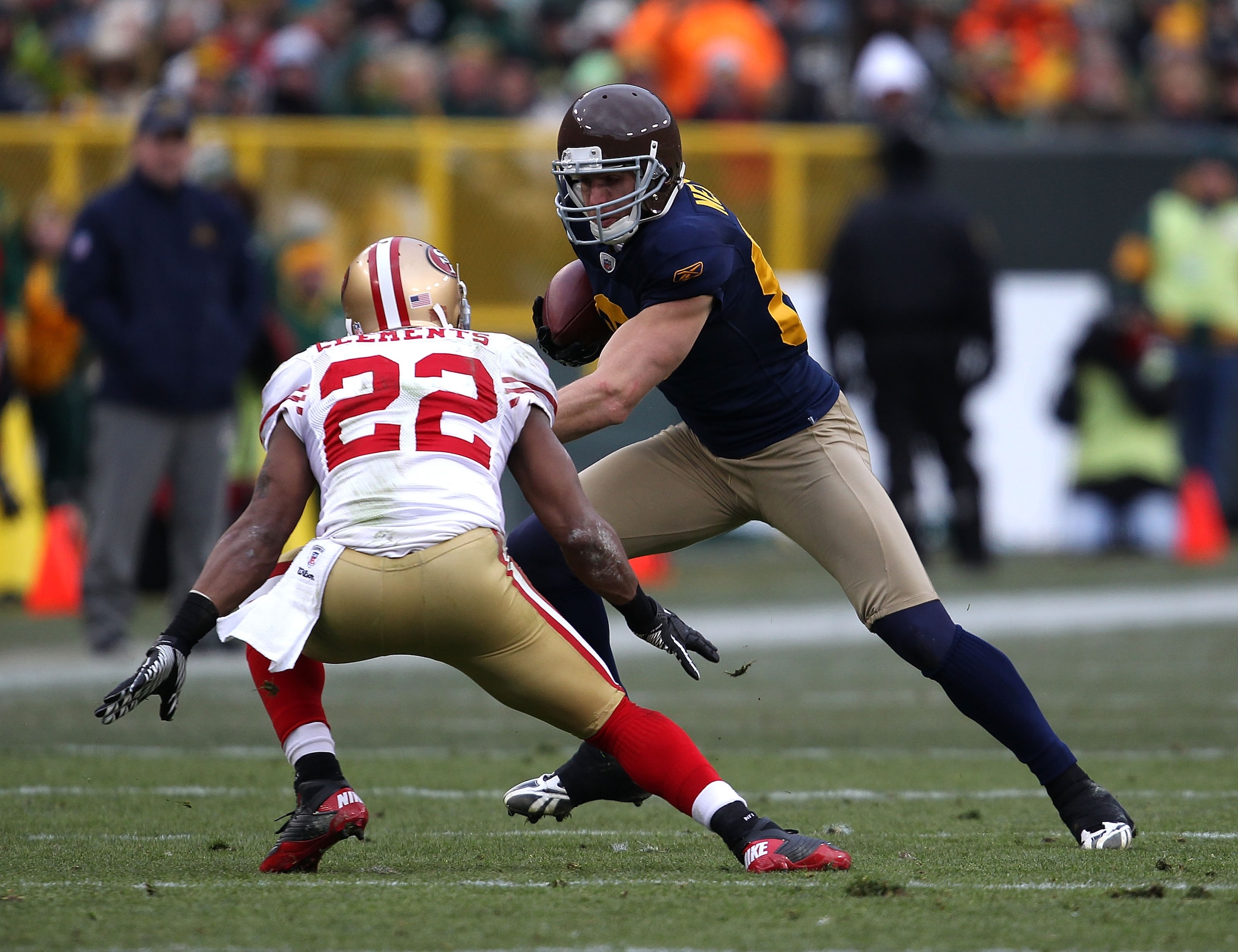 GREEN BAY, WI - DECEMBER 05: Jordy Nelson #87 of the Green Bay Packers moves against Nate Clements #22 of the San Francisco 49ers after catching a pass at Lambeau Field on December 5, 2010 in Green Bay, Wisconsin. The Packers defeated the 49ers 34-16. (P GREEN BAY, WI - DECEMBER 05: Jordy Nelson #87 of the Green Bay Packers moves against Nate Clements #22 of the San Francisco 49ers after catching a pass at Lambeau Field on December 5, 2010 in Green Bay, Wisconsin. The Packers defeated the 49ers 34-16. (P