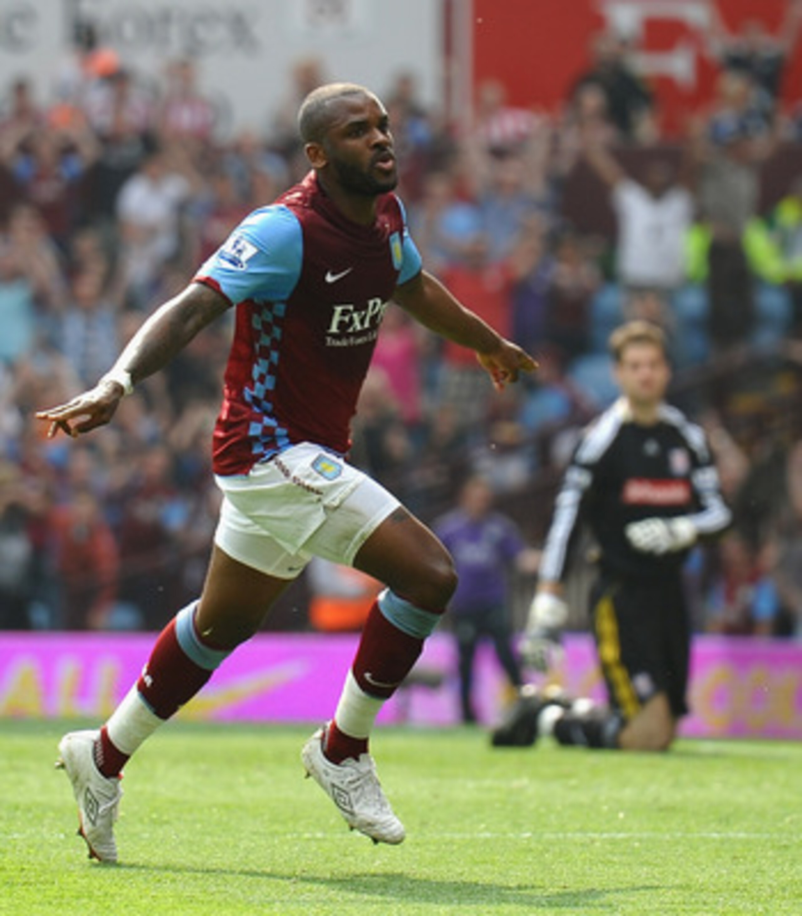 BIRMINGHAM, ENGLAND - APRIL 23:  Darren Bent of Aston Villa celebrates scoring the equaliser during the Barclays Premier League match between Aston Villa and Stoke City at Villa Park on April 23, 2011 in Birmingham, England.  (Photo by Laurence Griffiths/