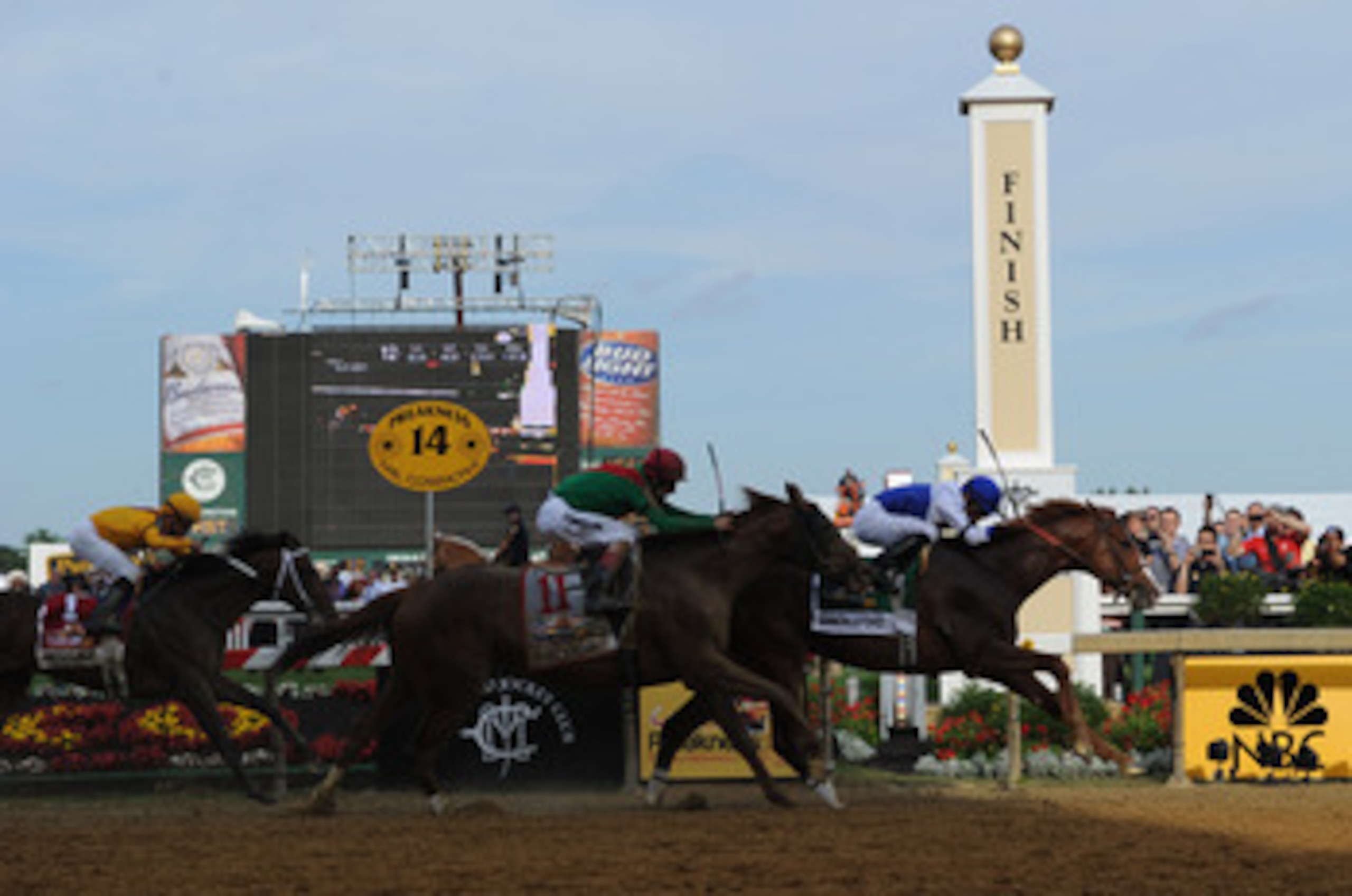 BALTIMORE, MD - MAY 21: Jockey Jesus Castanon guides Shackleford #5 to victory over Animal Kingdom and jocky John Velazquez #11  and Astrology with jockey Mike Smith #1 to win the 136th running of the Preakness Stakes at Pimlico Race Course on May 21, 201