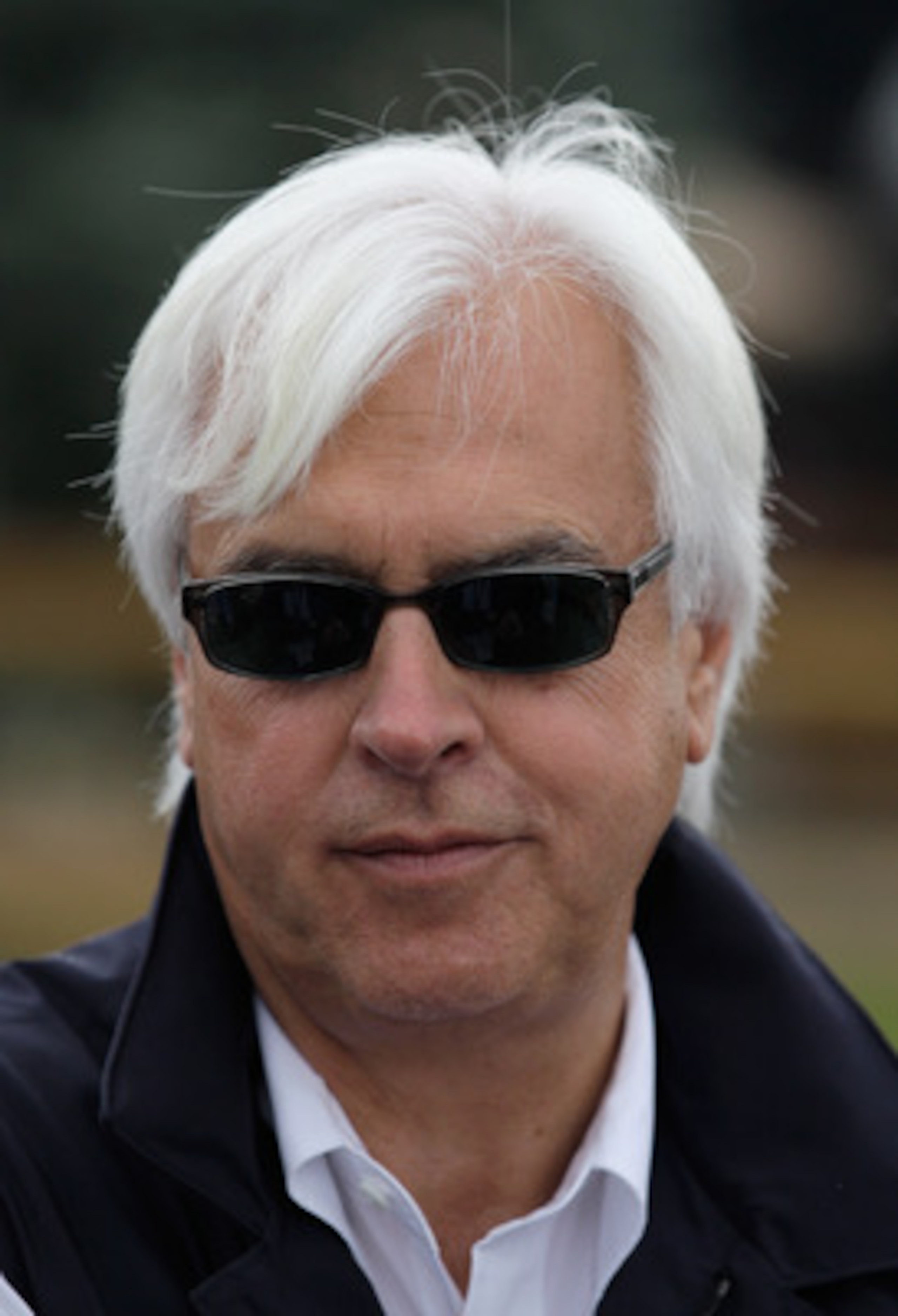 BALTIMORE, MD - MAY 19:  Bob Baffert, trainer of Preakness entrant Midnight Interlude, talks with the media outside the stakes barn at Pimlico Race Course on May 19, 2011 in Baltimore, Maryland. The 136th running of the Preakness Stakes will be run on Sat