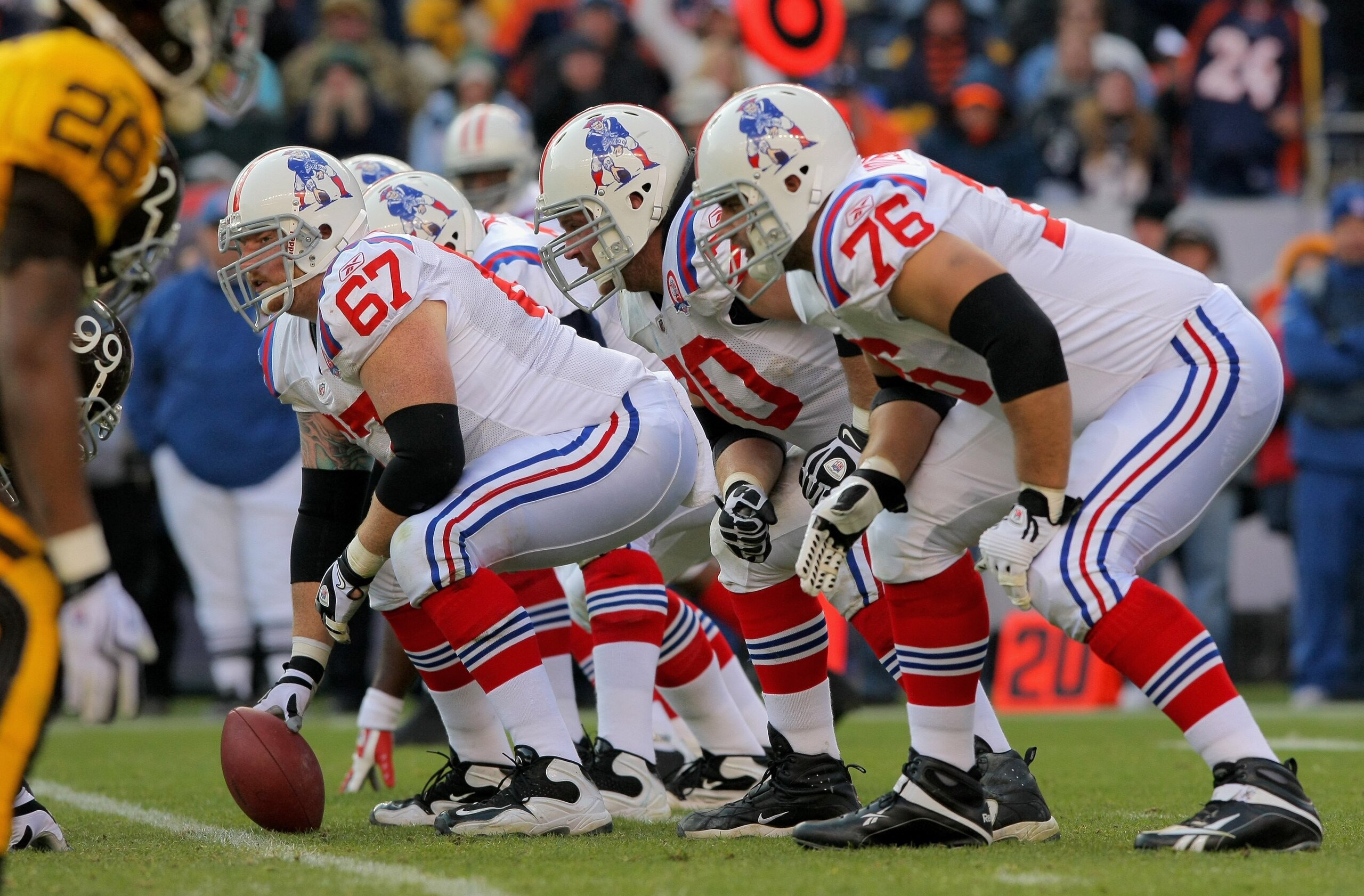 DENVER - OCTOBER 11: Center Dan Koppen #67 of the New England Patriots prepares to snap the ball as the offensive line readies for pass protection against the Denver Broncos during NFL action at Invesco Field at Mile High on October 11, 2009 in Denver, C DENVER - OCTOBER 11: Center Dan Koppen #67 of the New England Patriots prepares to snap the ball as the offensive line readies for pass protection against the Denver Broncos during NFL action at Invesco Field at Mile High on October 11, 2009 in Denver, C