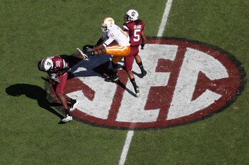 COLUMBIA, SC - OCTOBER 30: Justin Hunter #11 of the Tennessee Volunteers watches as Devin Taylor #98 of the South Carolina Gamecocks makes an interception during their game at Williams-Brice Stadium on October 30, 2010 in Columbia, South Carolina. (Phot COLUMBIA, SC - OCTOBER 30: Justin Hunter #11 of the Tennessee Volunteers watches as Devin Taylor #98 of the South Carolina Gamecocks makes an interception during their game at Williams-Brice Stadium on October 30, 2010 in Columbia, South Carolina. (Phot