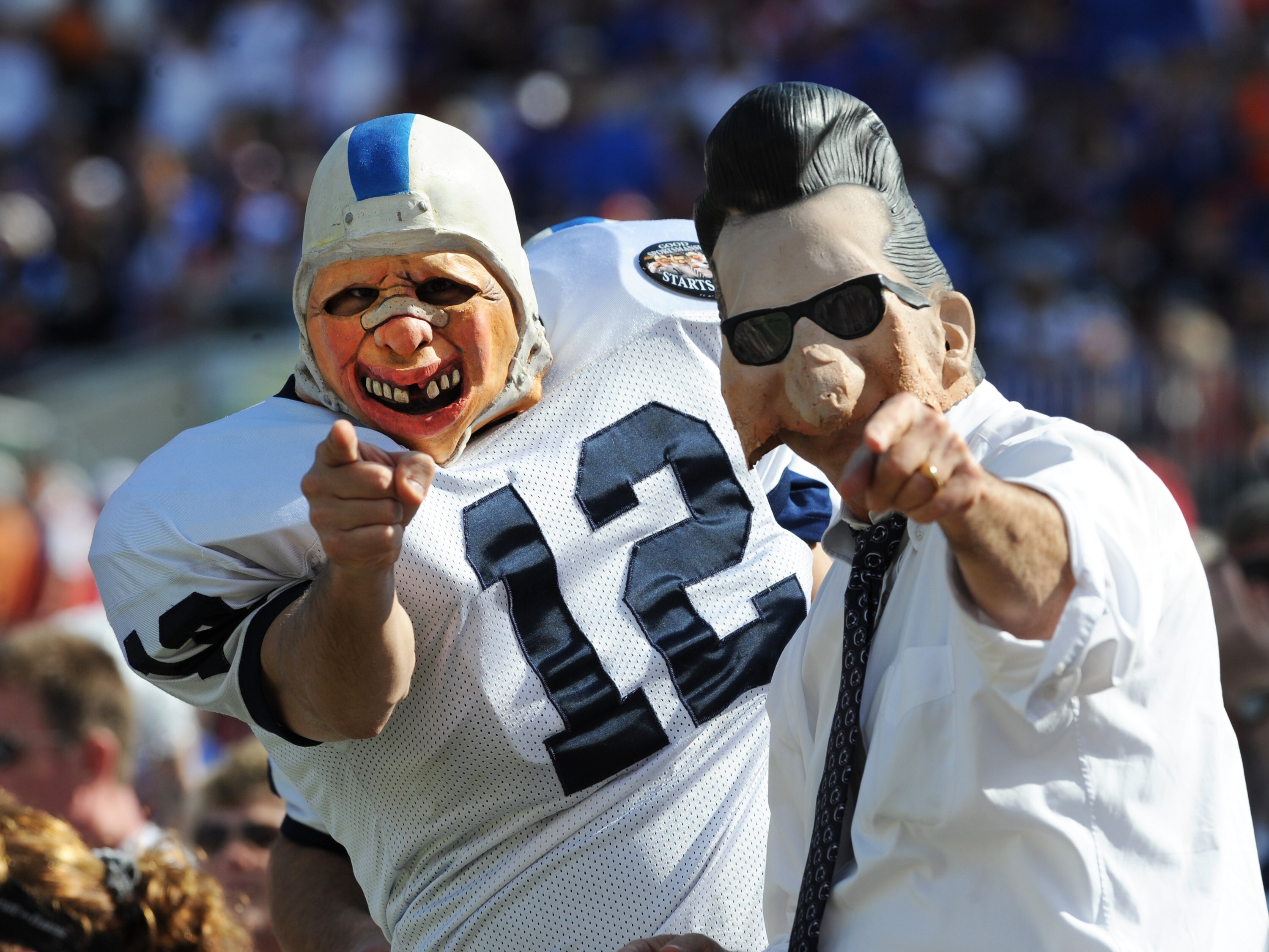 TAMPA, FL - JANUARY 1:  Fans of the Penn State Nittany Lions cheer play against the Florida Gators January 1, 2011 in the 25th Outback Bowl at Raymond James Stadium in Tampa, Florida.  (Photo by Al Messerschmidt/Getty Images)
