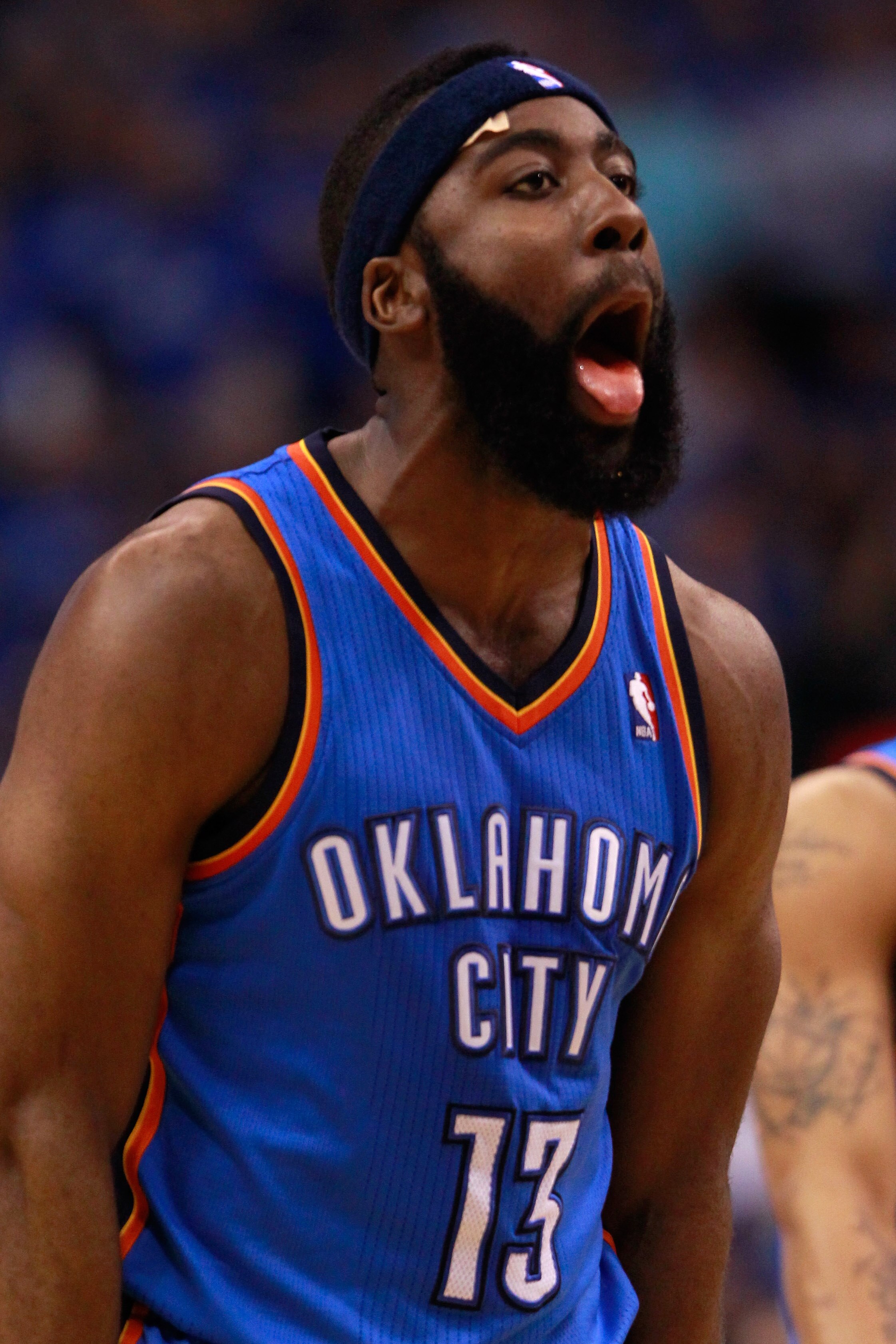 DALLAS, TX - MAY 19:  James Harden #13 of the Oklahoma City Thunder reacts after making a three-pointer in the fourth quarter while taking on the Dallas Mavericks in Game Two of the Western Conference Finals during the 2011 NBA Playoffs at American Airlin