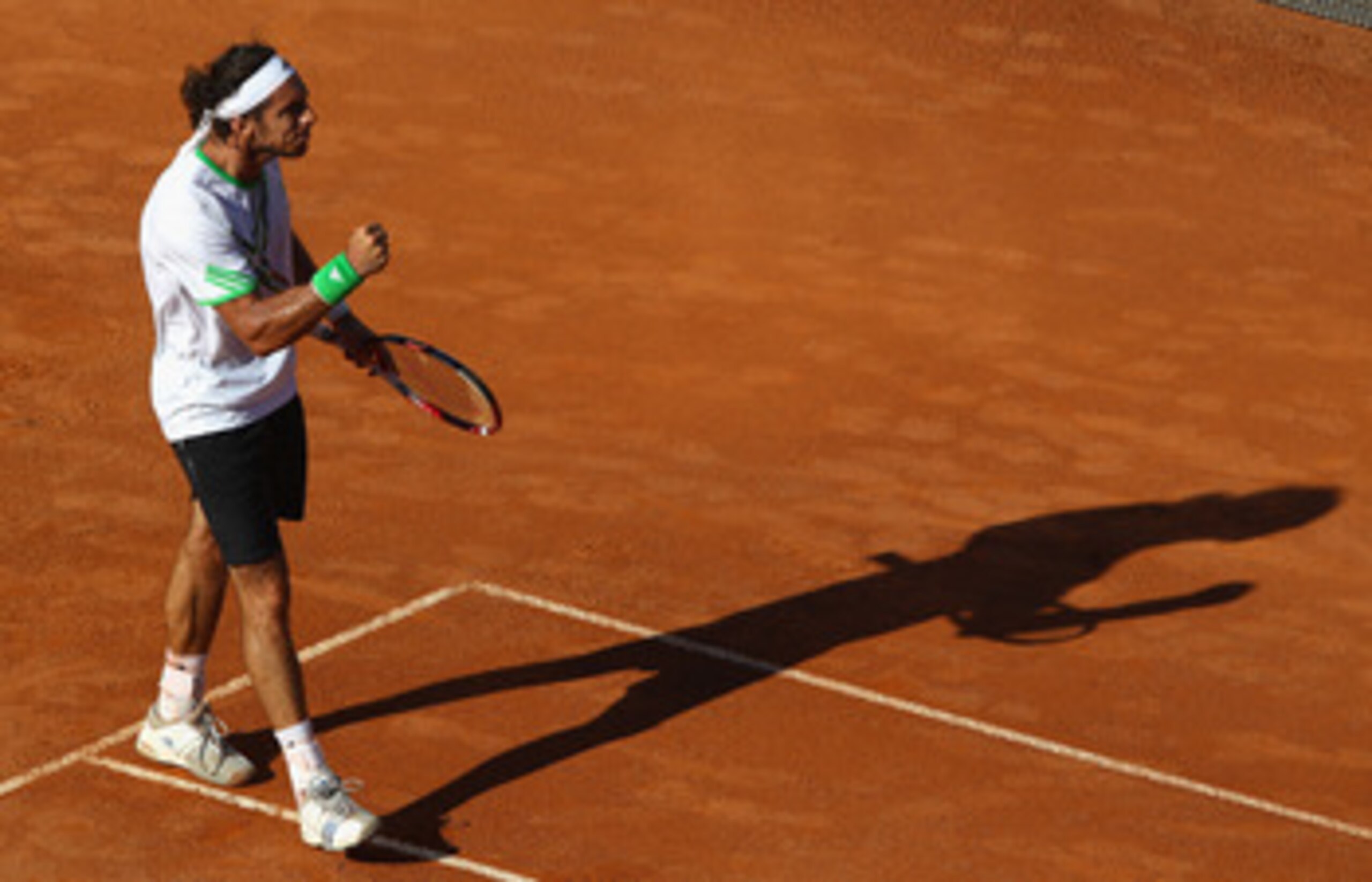 ROME, ITALY - MAY 08:  Juan Monaco of Argentina celebrates his three set victory after his frist round match against Andreas Seppi of Italy on day one of the Internazoinali BNL D'Italia at the Foro Italico Tennis Centre on May 8, 2011 in Rome, Italy.  (Ph