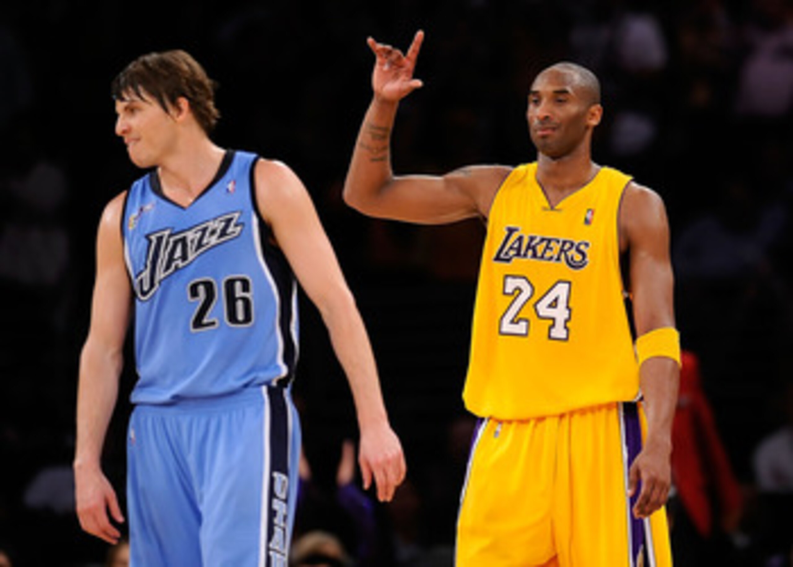 LOS ANGELES, CA - APRIL 27:  Kobe Bryant #24 of the Los Angeles Lakers reacts as he stands alongside Kyle Korver #26 of the Utah Jazz in the fourth quarter of Game Five of the Western Conference Quarterfinals during the 2009 NBA Playoffs at Staples Center