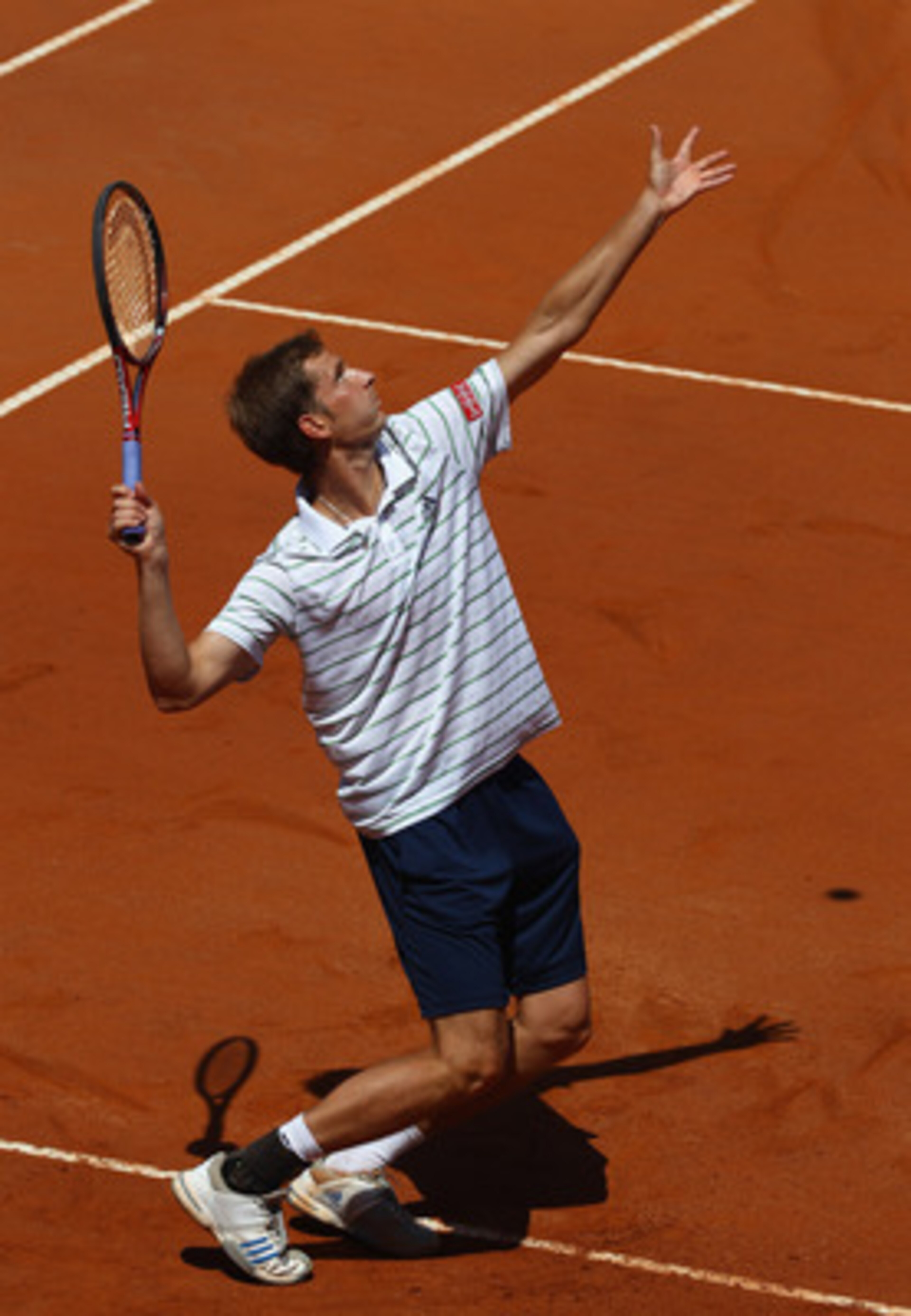 ROME, ITALY - MAY 13:  Florian Mayer of Germany serves during his quarter final match against Andy Murray of Great Britain during day six of the Internazoinali BNL D'Italia at the Foro Italico Tennis Centre  on May 13, 2011 in Rome, Italy.  (Photo by Cliv