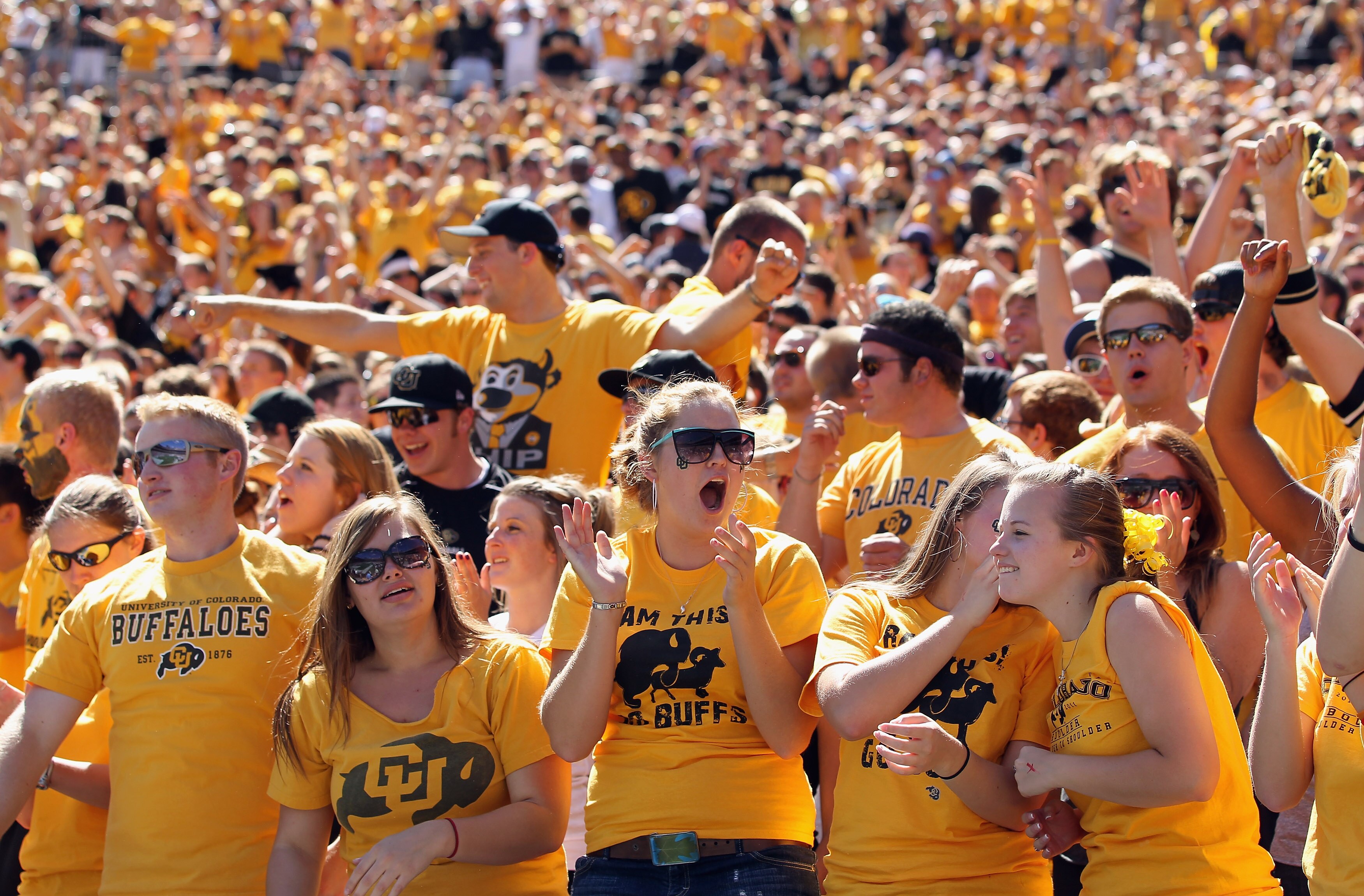 DENVER - SEPTEMBER 04:  Student fans of the Colorado Buffaloes support their team as they face the Colorado State Rams in the Rocky Mountain Showdown at INVESCO Field at Mile High on September 4, 2010 in Denver, Colorado. Colorado was awarded the Centenia