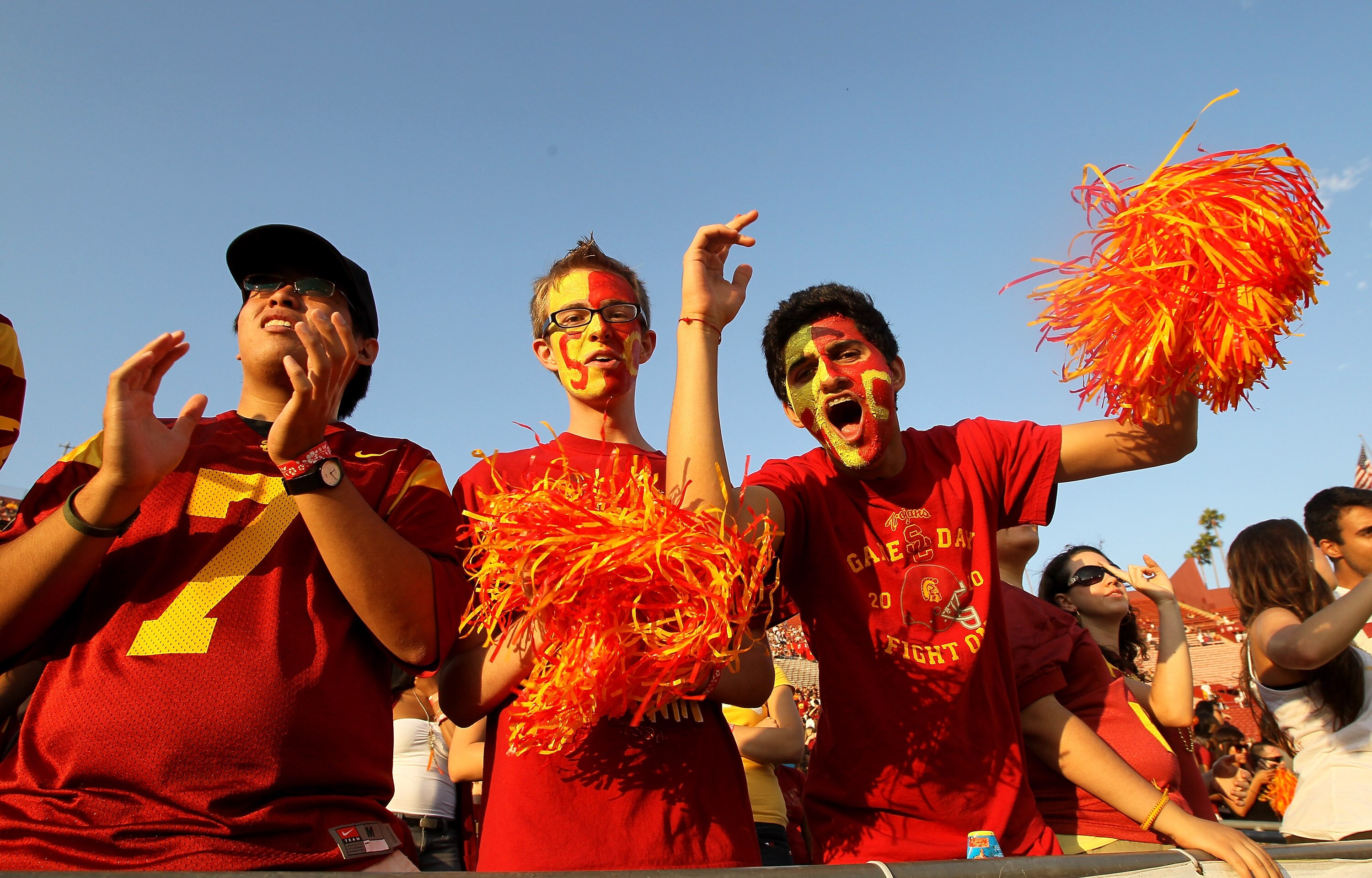 LOS ANGELES, CA - OCTOBER 02:   USC Trojans fans cheer during the game with the Washington Huskies at the Los Angeles Memorial Coliseum on October 2, 2010 in Los Angeles, California.  Washington won 32-31.  (Photo by Stephen Dunn/Getty Images)