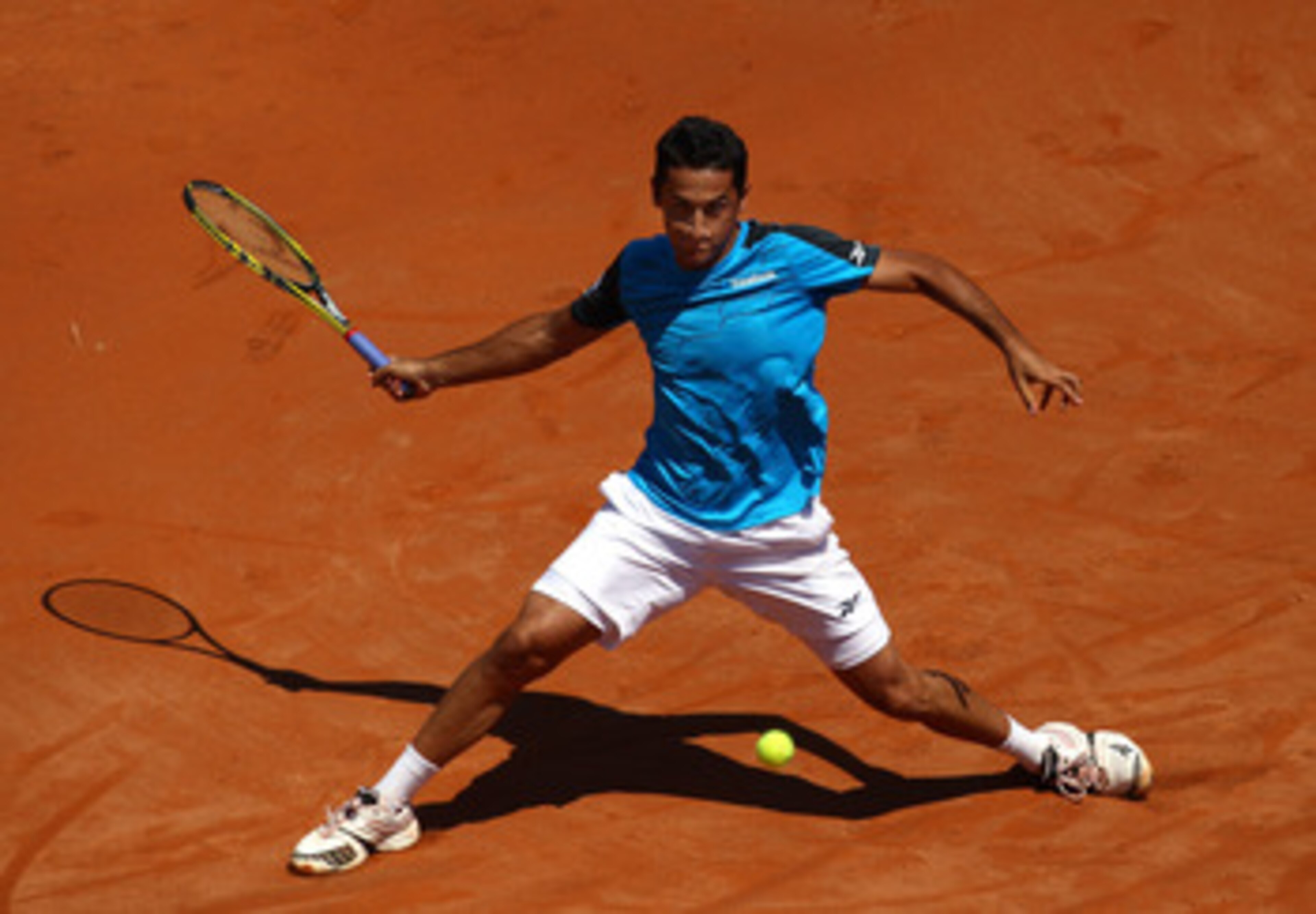 ROME, ITALY - MAY 10:  Nicolas Almagro of Spain plays a forehand return during the his first round match against Simone Bolelli of Italy during day three of the Internazionali BNL d'Italia at the Foro Italico Tennis Centre on May 10, 2011 in Rome, Italy. 