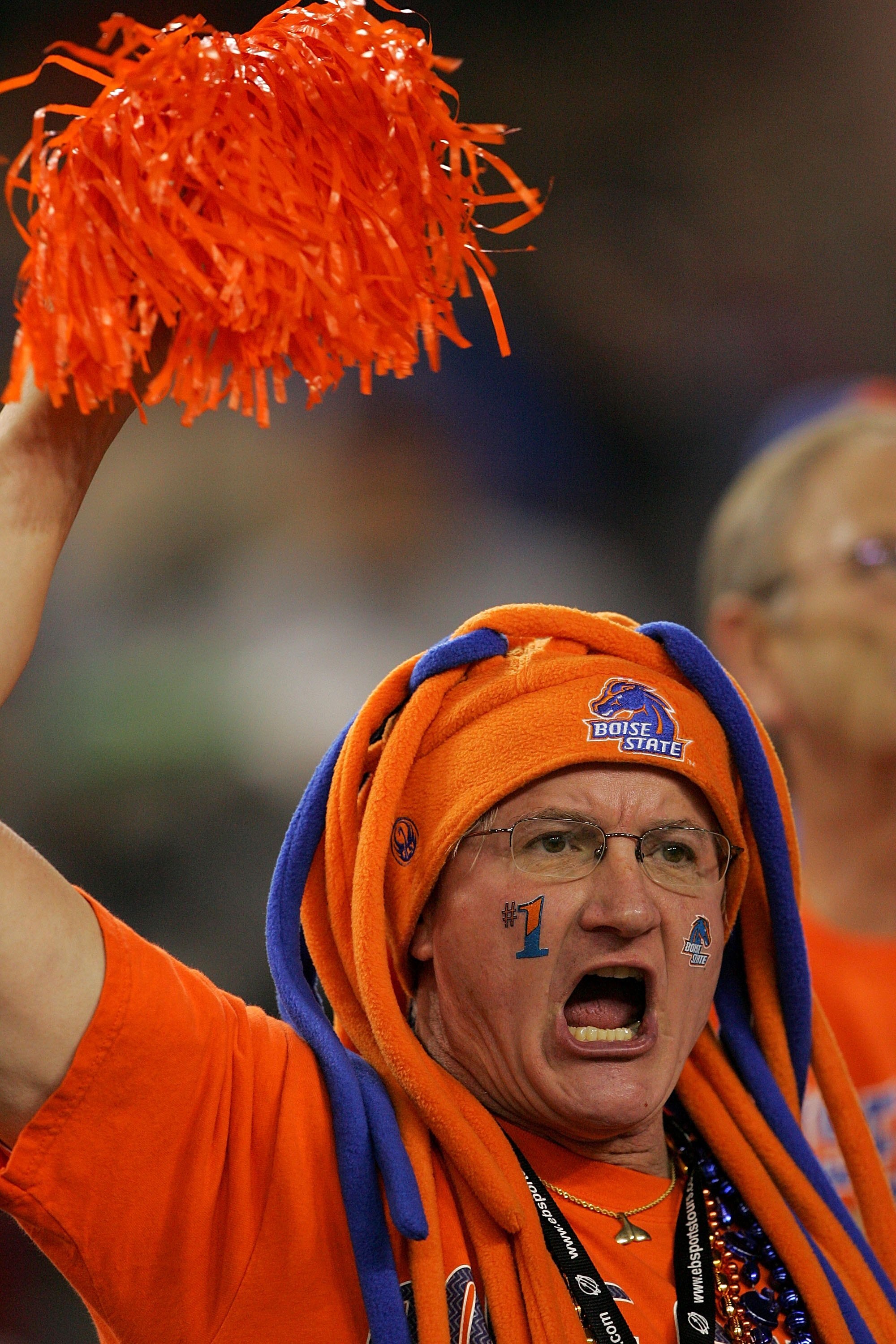 GLENDALE, AZ - JANUARY 01:  A Boise State Broncos fan cheers on his team at the Tostito's Fiesta Bowl against the Oklahoma Sooners at University of Phoenix Stadium January 1, 2007 in Glendale, Arizona.   (Photo by Lisa Blumenfeld/Getty Images)