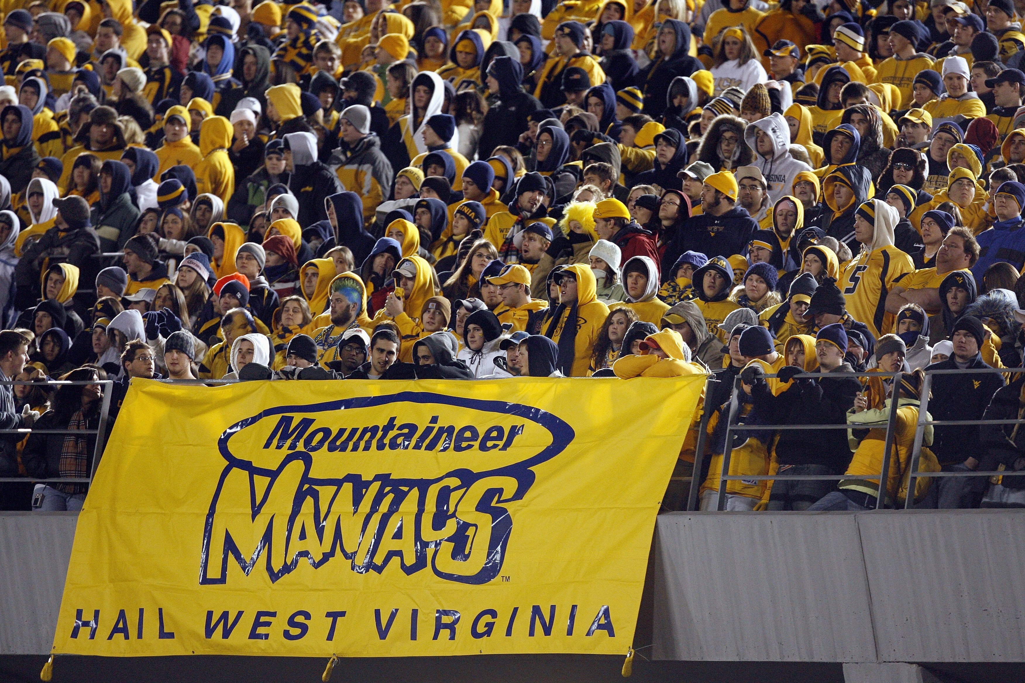 MORGANTOWN, WV - DECEMBER 1: Fans of the West Virginia Mountaineers watch the game during the game against the Pittsburgh Panthers at Milan Puskar Stadium on December 1, 2007 in Morgantown, West Virginia. (Photo by Kevin C. Cox/Getty Images)