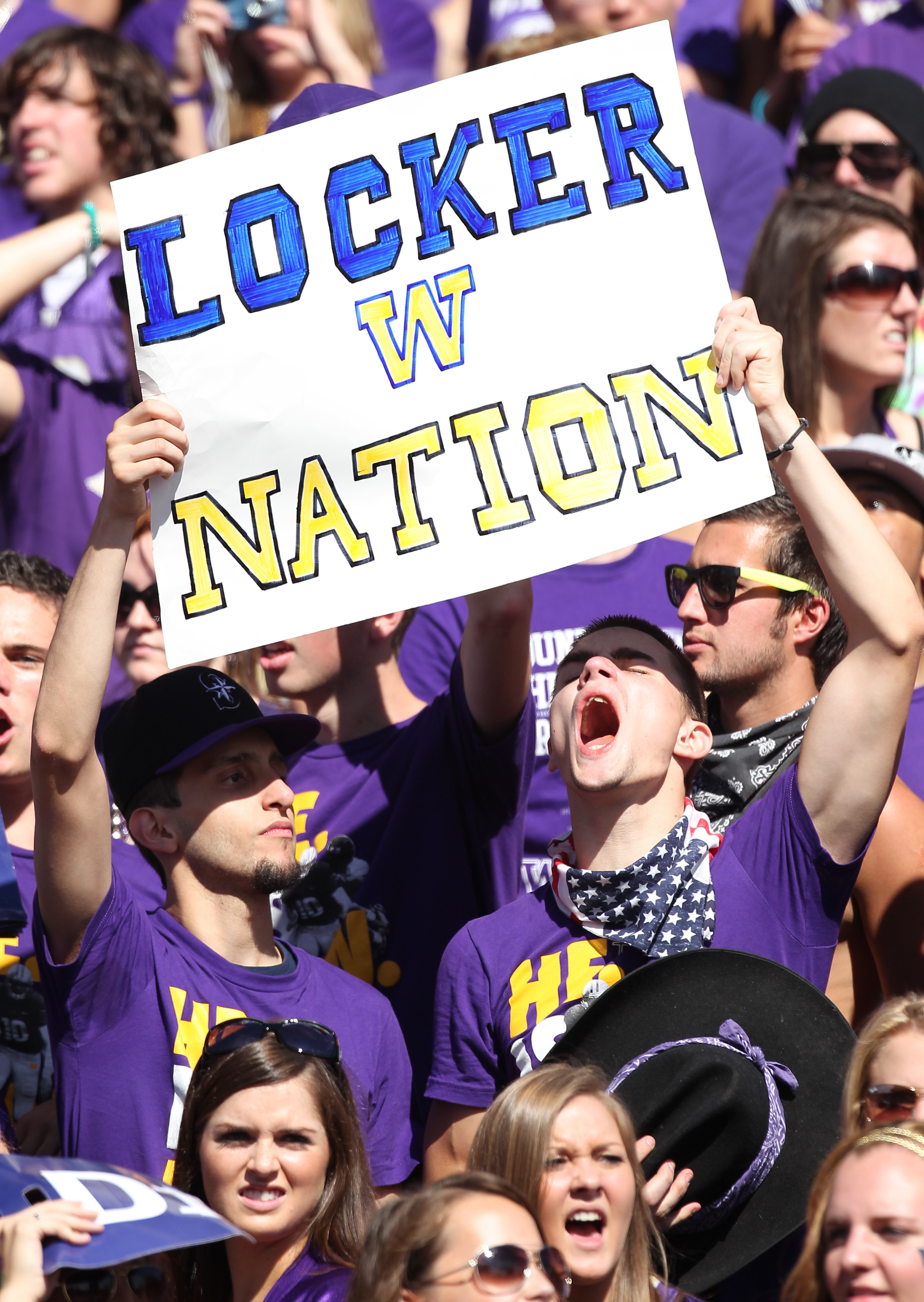 SEATTLE - SEPTEMBER 18: Fans of the Washington Huskies cheer during the game against the Nebraska Cornhuskers on September 18, 2010 at Husky Stadium in Seattle, Washington. (Photo by Otto Greule Jr/Getty Images)