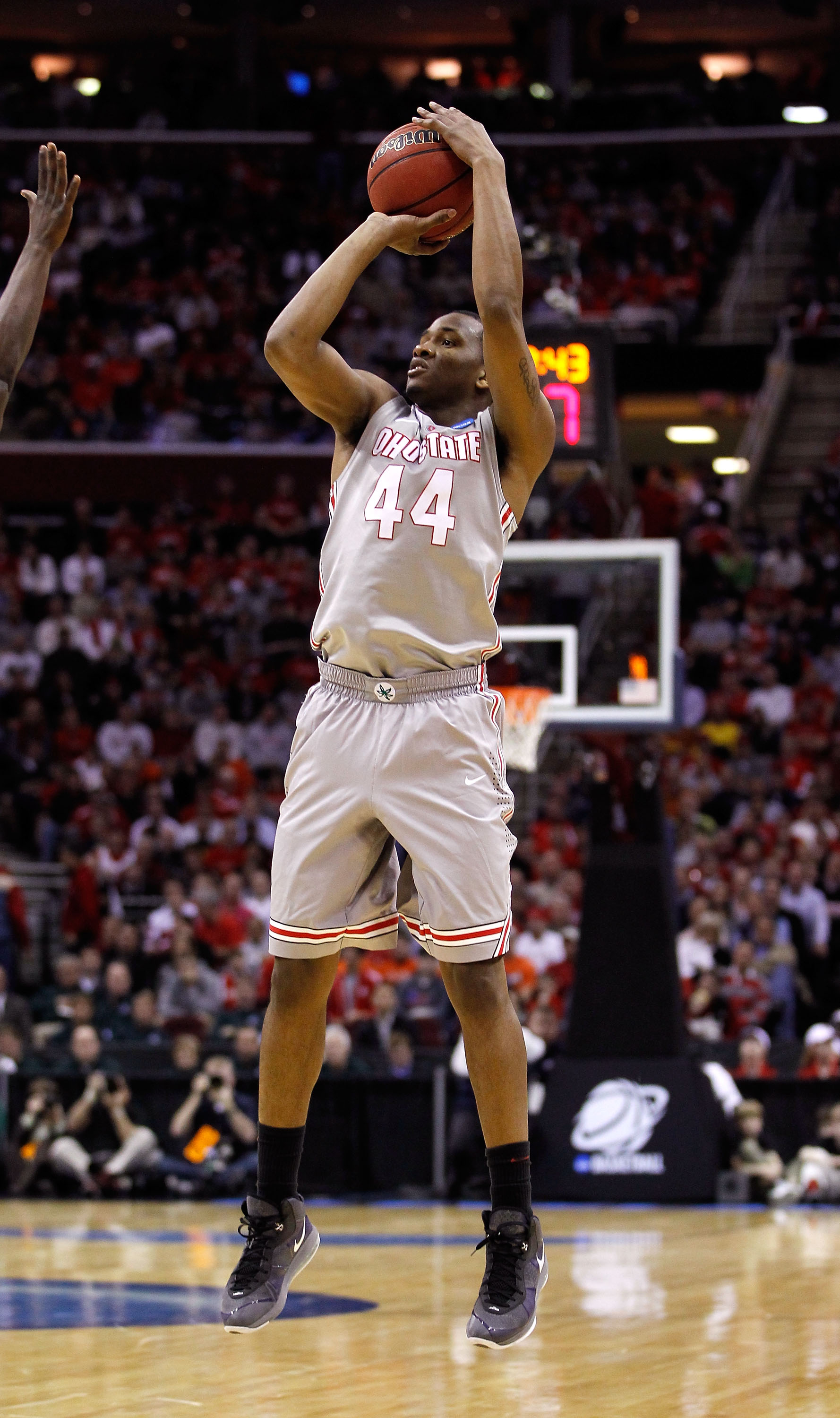 CLEVELAND, OH - MARCH 20: William Buford #44 of the Ohio State Buckeyes shoots against the George Mason Patriots during the third of the 2011 NCAA men's basketball tournament at Quicken Loans Arena on March 20, 2011 in Cleveland, Ohio.  (Photo by Gregory