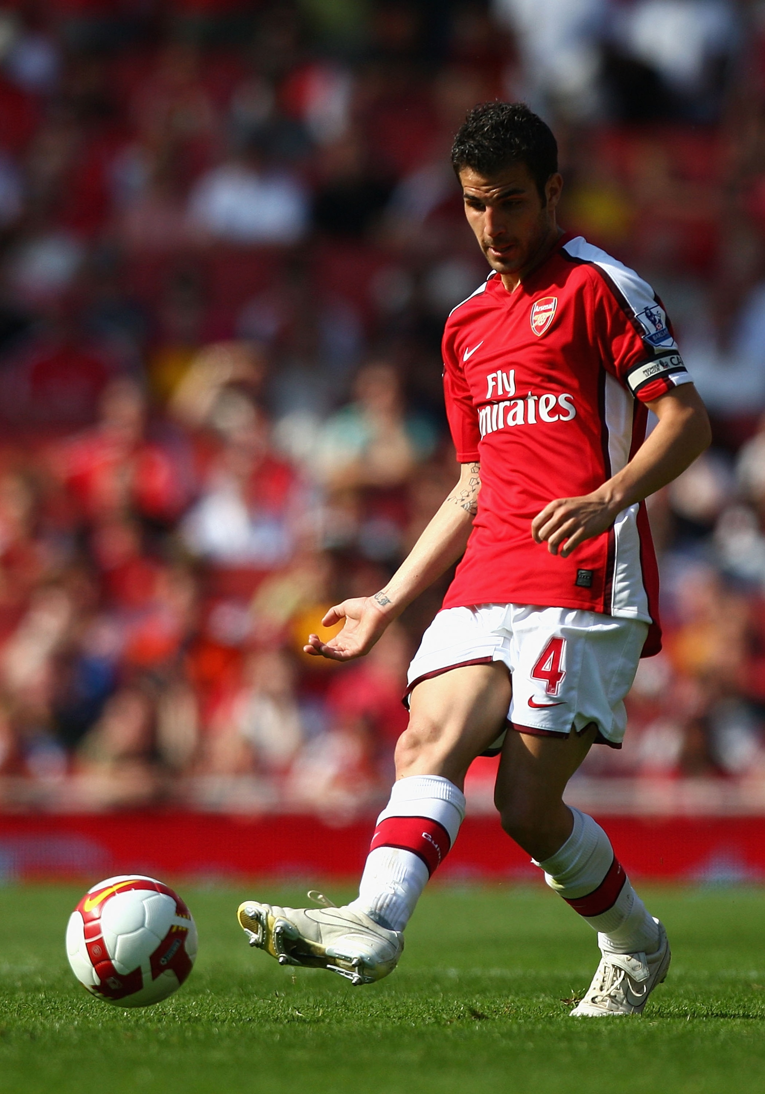 LONDON, ENGLAND - MAY 24:  Cesc Fabregas of Arsenal passes the ball during the Barclays Premier League match between Arsenal and Stoke City at Emirates Stadium on May 24, 2009 in London, England.  (Photo by Ryan Pierse/Getty Images)