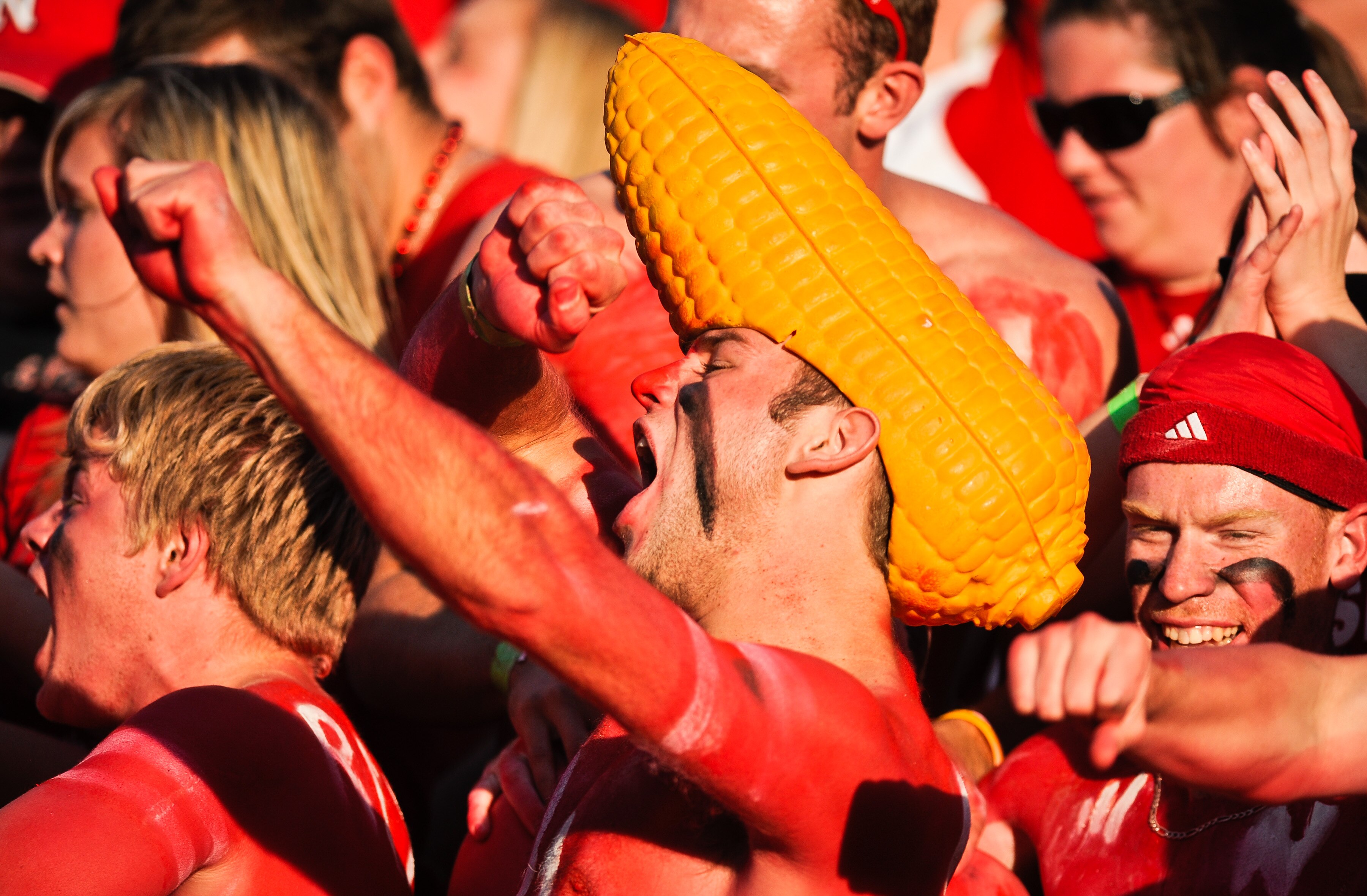 LINCOLN, NE - OCTOBER 16: Fans of the Nebraska Cornhuskers react after fourth a quarter punt return for a touchdown of their game against the Texas Longhorns at Memorial Stadium on October 16, 2010 in Lincoln, Nebraska. Texas Defeated Nebraska 20-13. (Pho