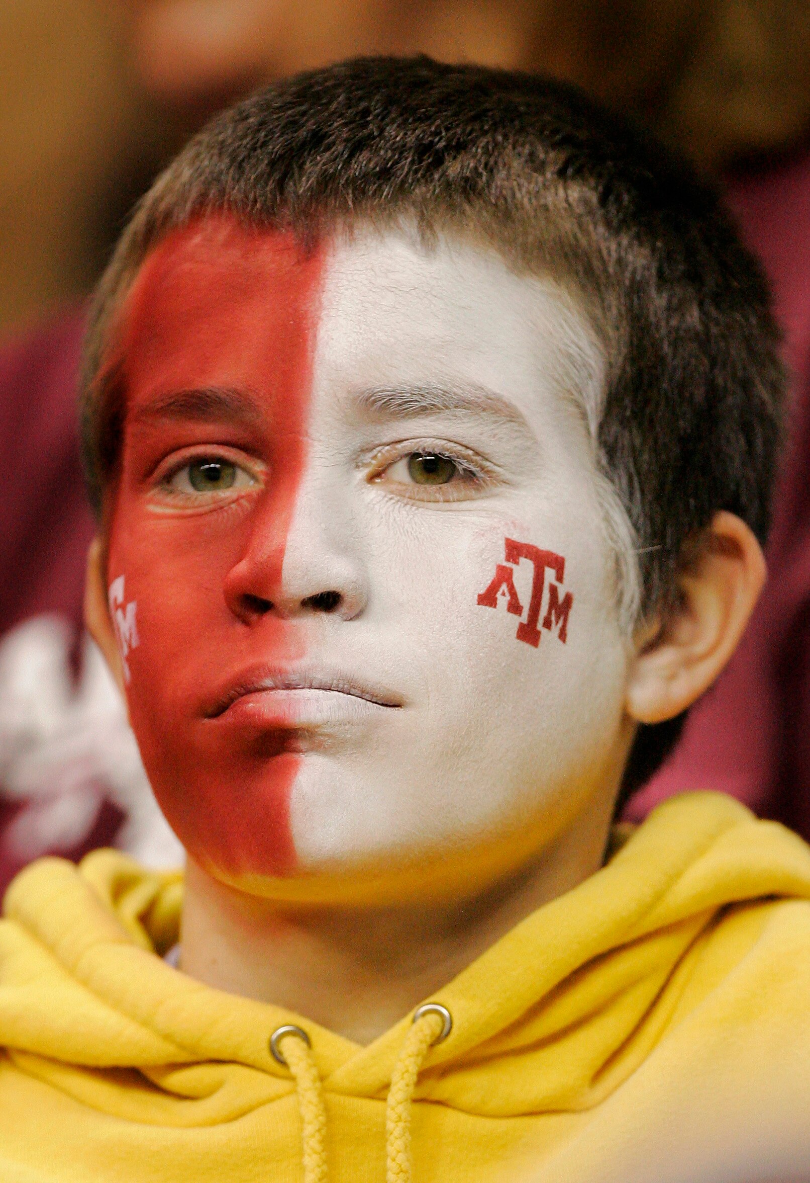 SAN ANTONIO - DECEMBER 29:  A young Texas A&M Aggies fan waits for the Valero Alamo Bowl against the Penn State Nittany Lions on December 29, 2007 at the Alamodome in San Antonio, Texas.  (Photo by Brian Bahr/Getty Images)