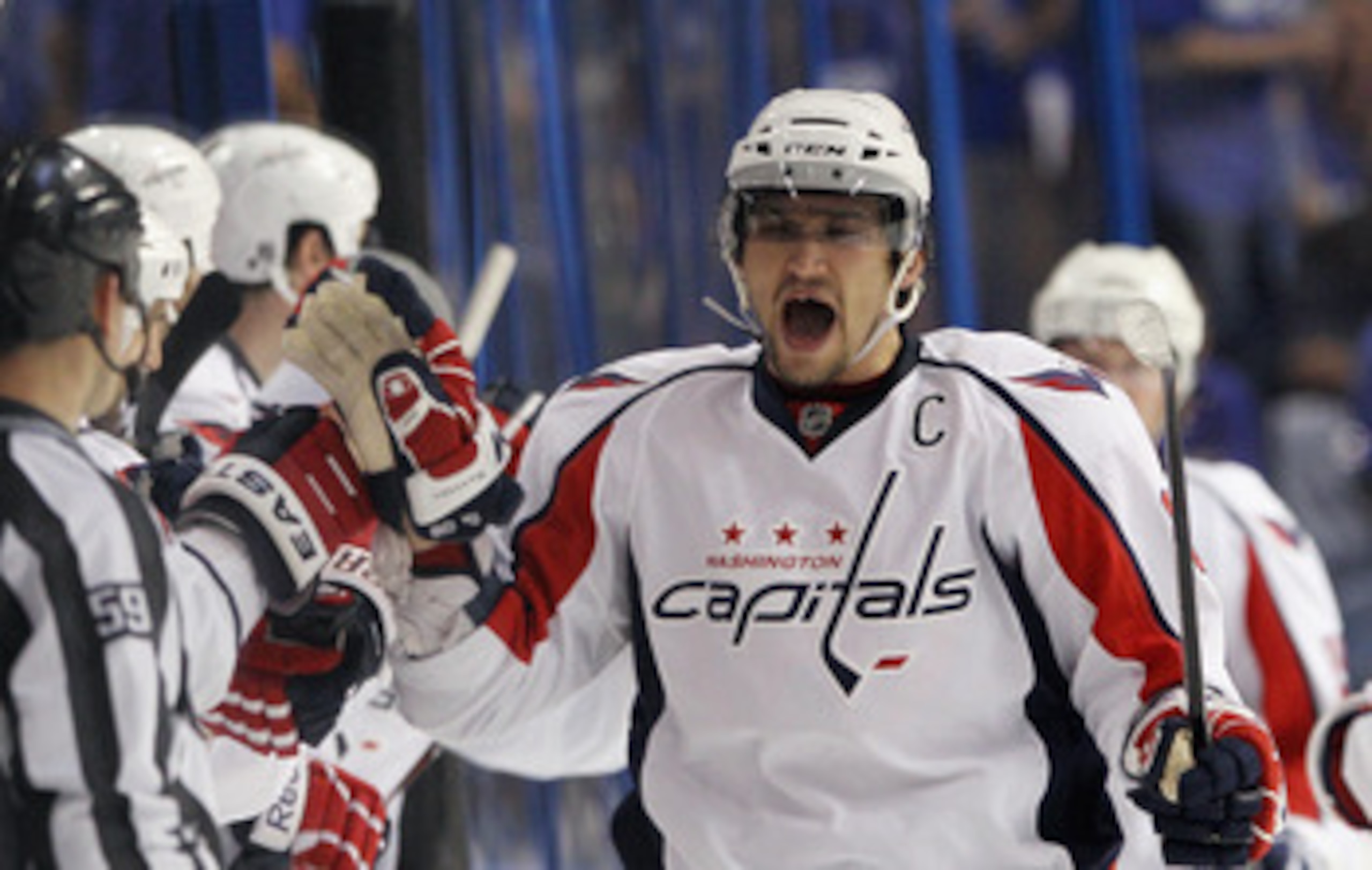 TAMPA, FL - MAY 03:  Alex Ovechkin #8 of the Washington Capitals celebrates a goal by Mike Knuble #22 (not shown) at 59 seconds of the second period against the Tampa Bay Lightning in Game Three of the Eastern Conference Semifinals during the 2011 NHL Sta