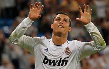 MADRID, SPAIN - MAY 10:  Cristiano Ronaldo of Real Madrid celebrates after scoring his side fourth goal during the La Liga match between Real Madrid and Getafe at Estadio Santiago Bernabeu on May 10, 2011 in Madrid, Spain.  (Photo by Angel Martinez/Getty
