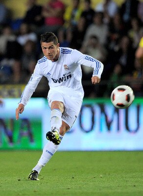 VILLARREAL, SPAIN - MAY 15:  : Cristiano Ronaldo of Real Madrid scores Real's third goal from a free kick during the La Liga match between Villarreal and Real Madrid at estadio El Madrigal on May 15, 2011 in Villarreal, Spain.  (Photo by Denis Doyle/Getty