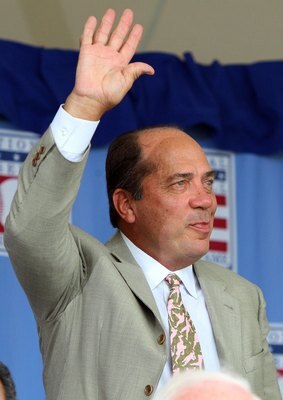 COOPERSTOWN, NY - JULY 26:  Hall of Famer Johnny Bench waves to the crowd as he is introduced at Clark Sports Center during the 2009  Baseball Hall of Fame induction ceremony on July 26, 2009 in Cooperstown, New York.  (Photo by Jim McIsaac/Getty Images)