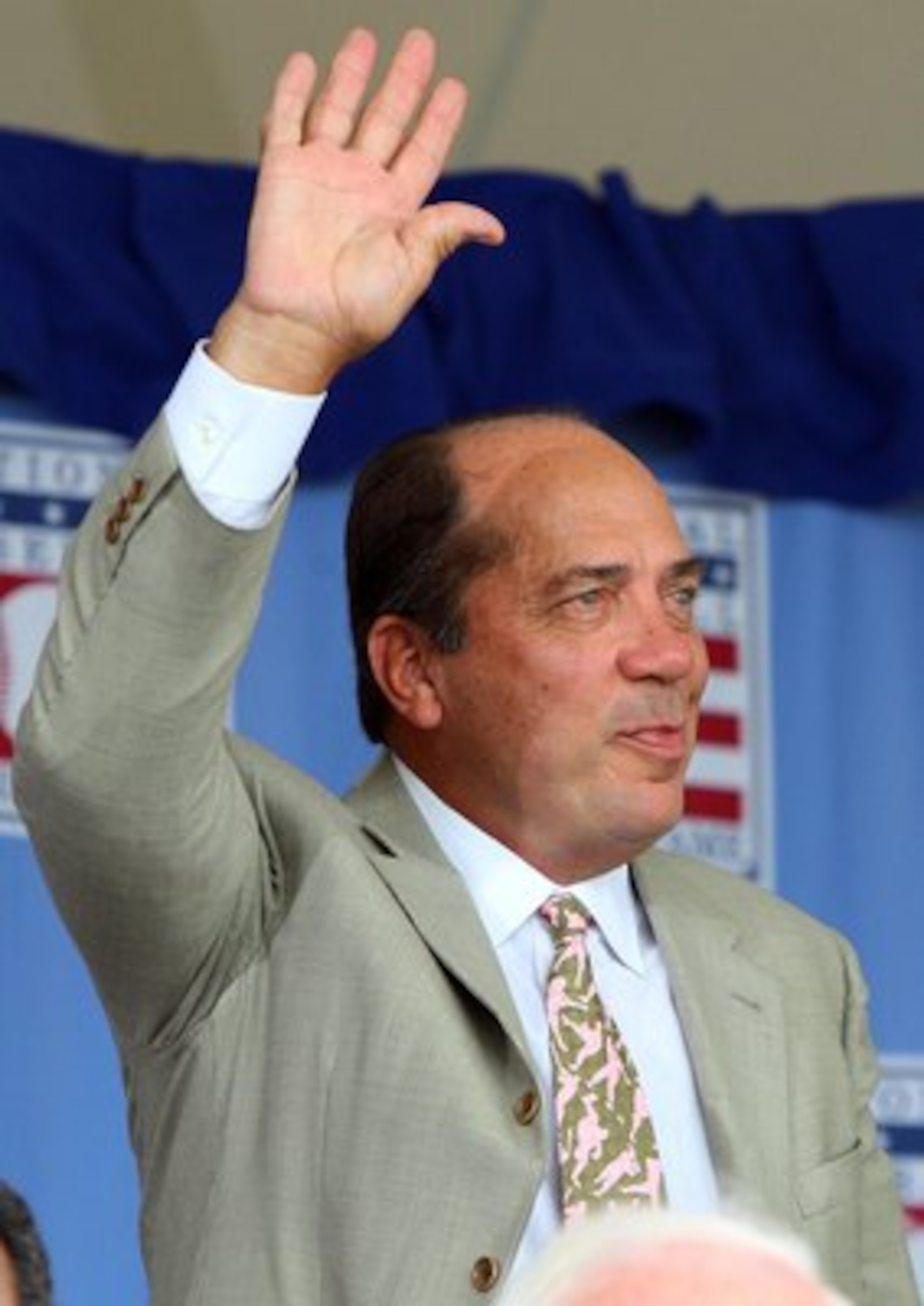 COOPERSTOWN, NY - JULY 26:  Hall of Famer Johnny Bench waves to the crowd as he is introduced at Clark Sports Center during the 2009  Baseball Hall of Fame induction ceremony on July 26, 2009 in Cooperstown, New York.  (Photo by Jim McIsaac/Getty Images)