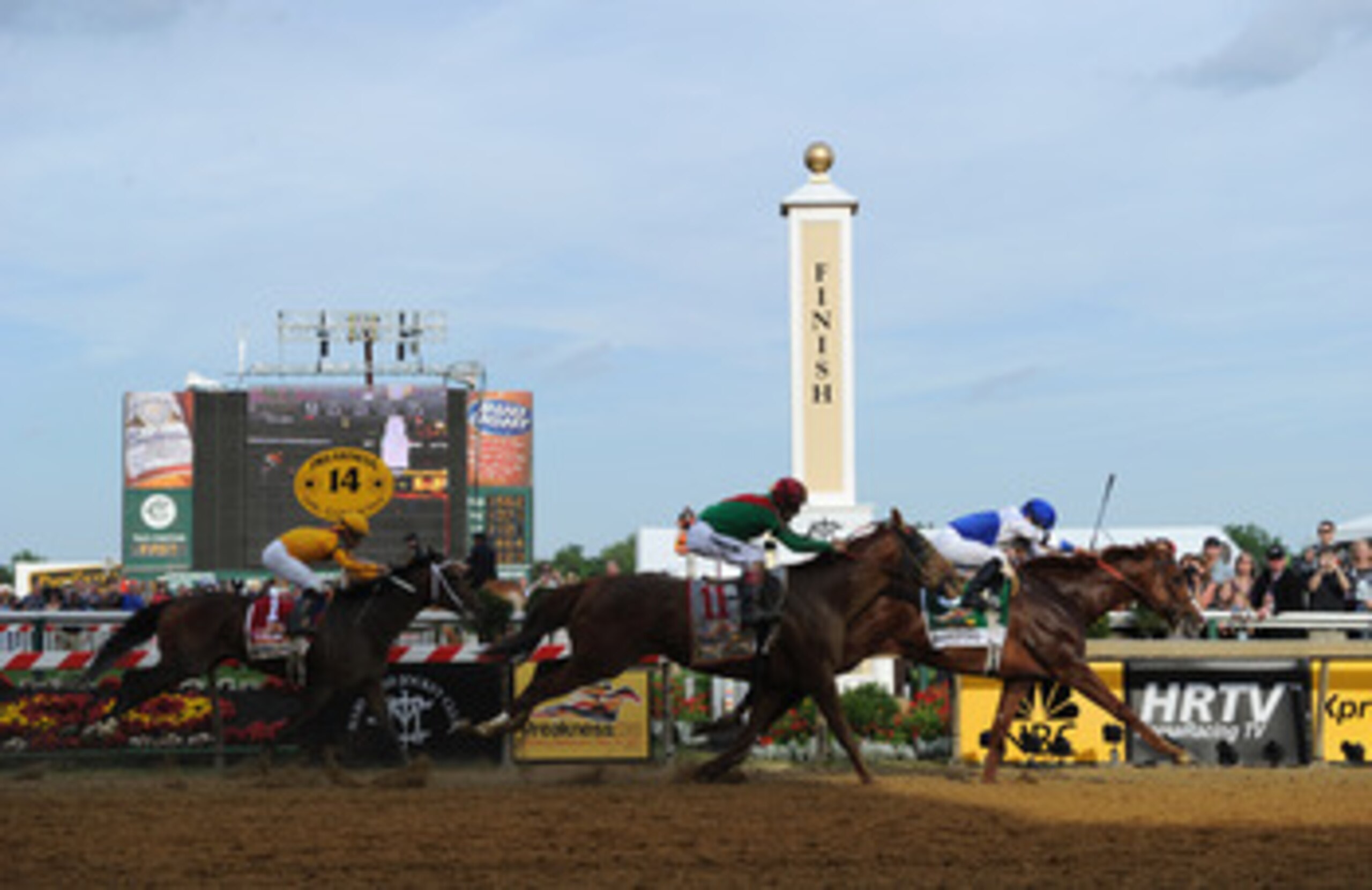 BALTIMORE, MD - MAY 21:  Jockey Jesus Castanon guides Shackleford #5 to victory over Animal Kingdom and jocky John Velazquez #11  and Astrology with jockey Mike Smith #1 to win the 136th running of the Preakness Stakes at Pimlico Race Course on May 21, 20