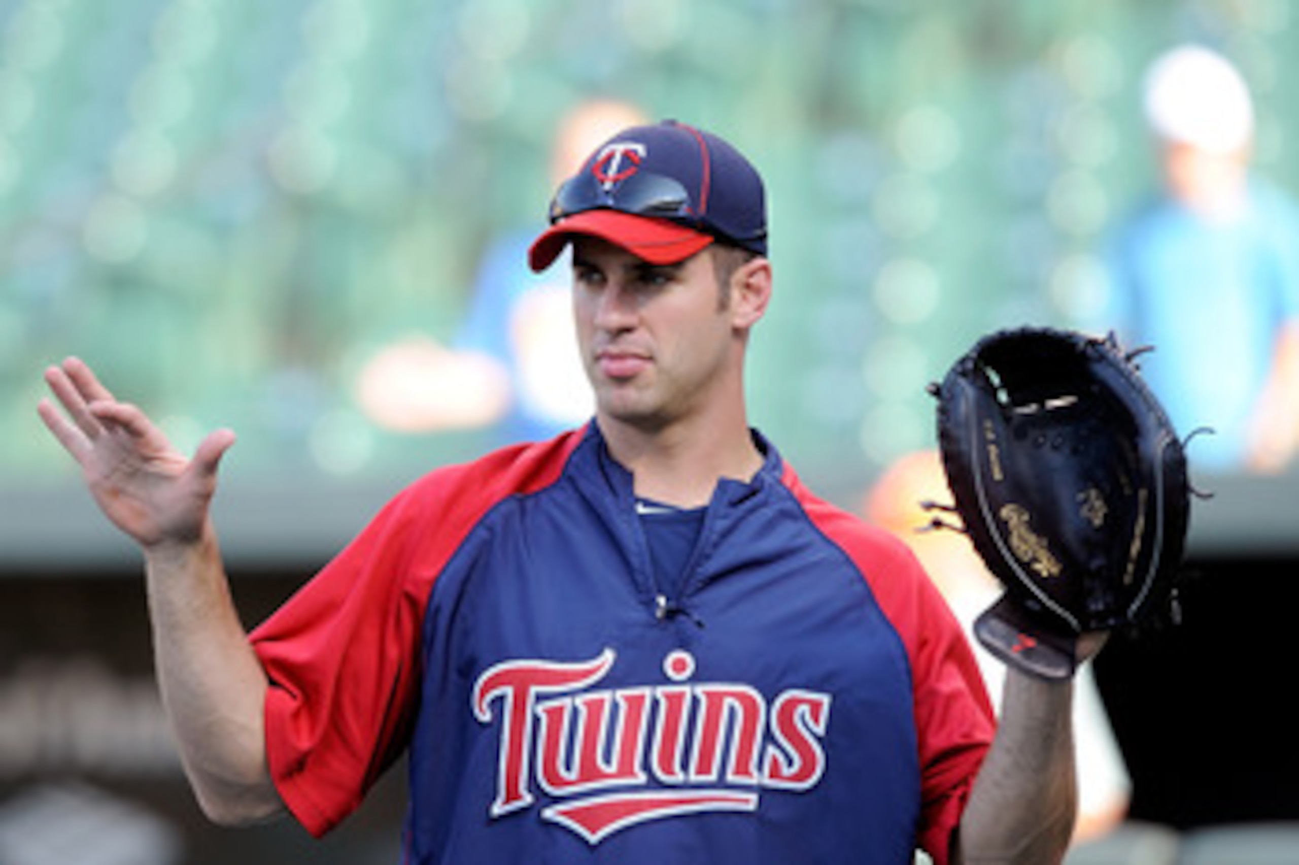 BALTIMORE - JULY 22: Joe Mauer #7 of the Minnesota Twins warms up before the game against the Baltimore Orioles at Camden Yards on July 22, 2010 in Baltimore, Maryland. (Photo by Greg Fiume/Getty Images) BALTIMORE - JULY 22: Joe Mauer #7 of the Minnesota Twins warms up before the game against the Baltimore Orioles at Camden Yards on July 22, 2010 in Baltimore, Maryland. (Photo by Greg Fiume/Getty Images)