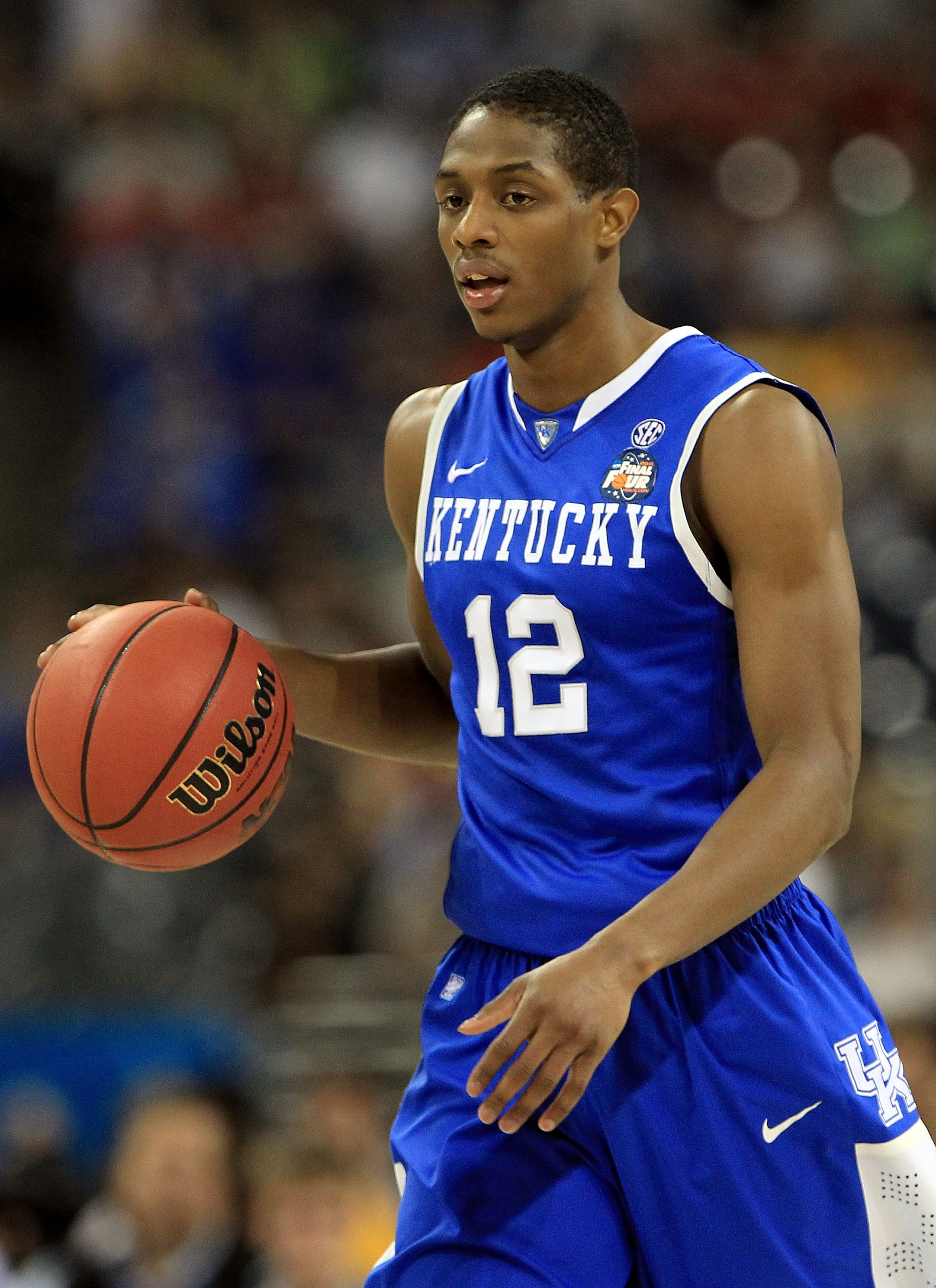 HOUSTON, TX - APRIL 02:  Brandon Knight #12 of the Kentucky Wildcats moves the ball while taking on the Connecticut Huskies during the National Semifinal game of the 2011 NCAA Division I Men's Basketball Championship at Reliant Stadium on April 2, 2011 in