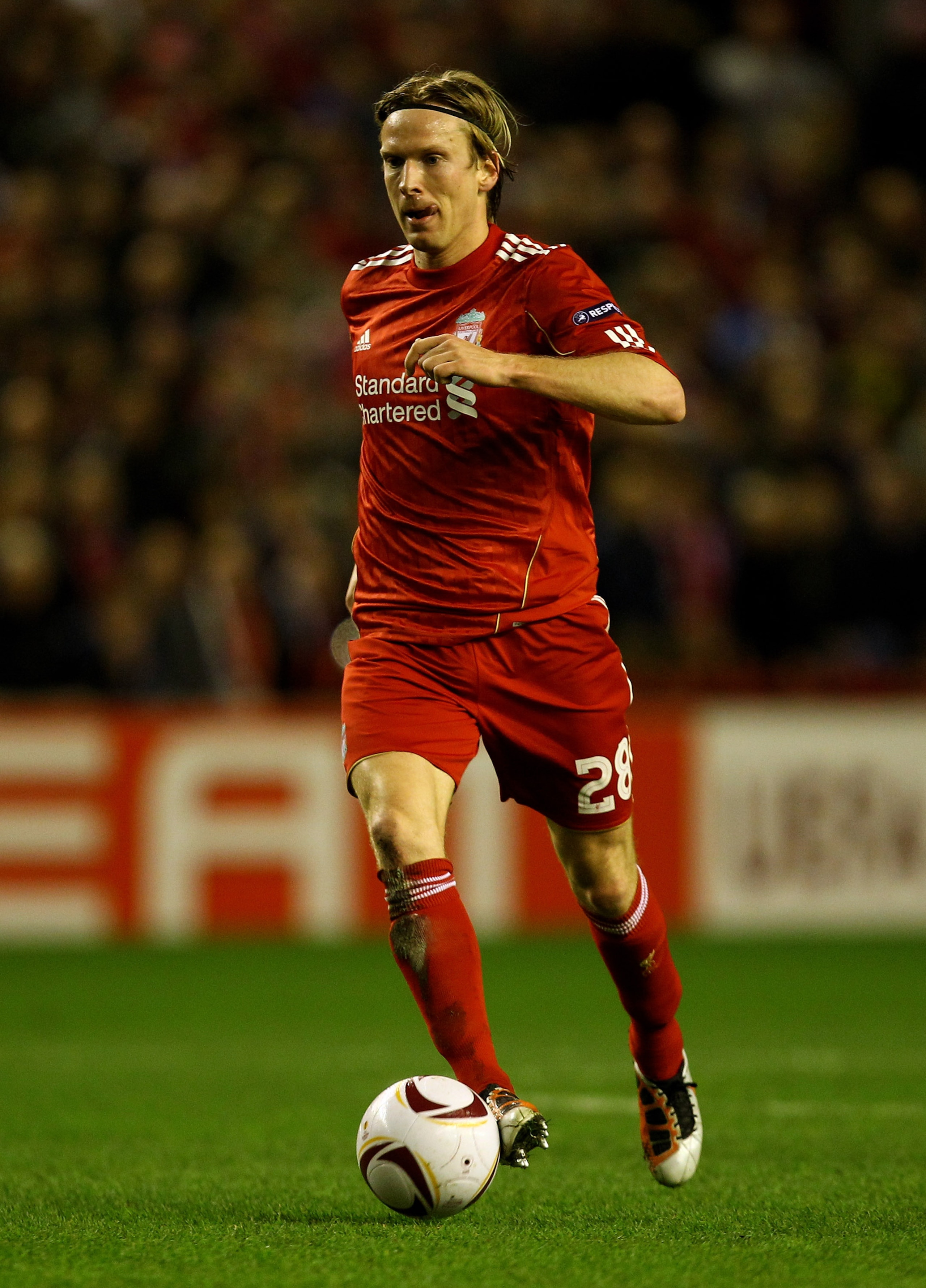 LIVERPOOL, ENGLAND - FEBRUARY 24:  Christian Poulsen of Liverpool in action during the UEFA Europa League Round of 32 2nd leg match beteween Liverpool and Sparta Prague at Anfield on February 24, 2011 in Liverpool, England.  (Photo by Richard Heathcote/Ge