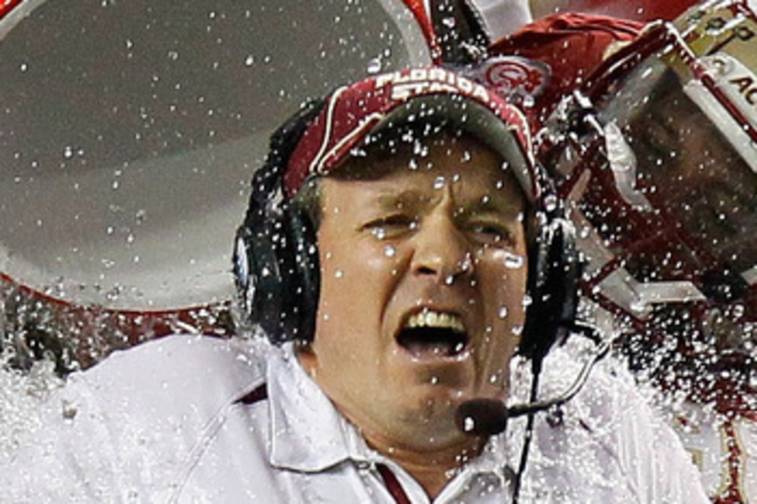 ATLANTA, GA - DECEMBER 31:  Head coach JimboFisher of the Florida State Seminoles is doused with water in the final seconds of their 26-17 win over the South Carolina Gamecocks during the 2010 Chick-fil-A Bowl at Georgia Dome on December 31, 2010 in Atlan