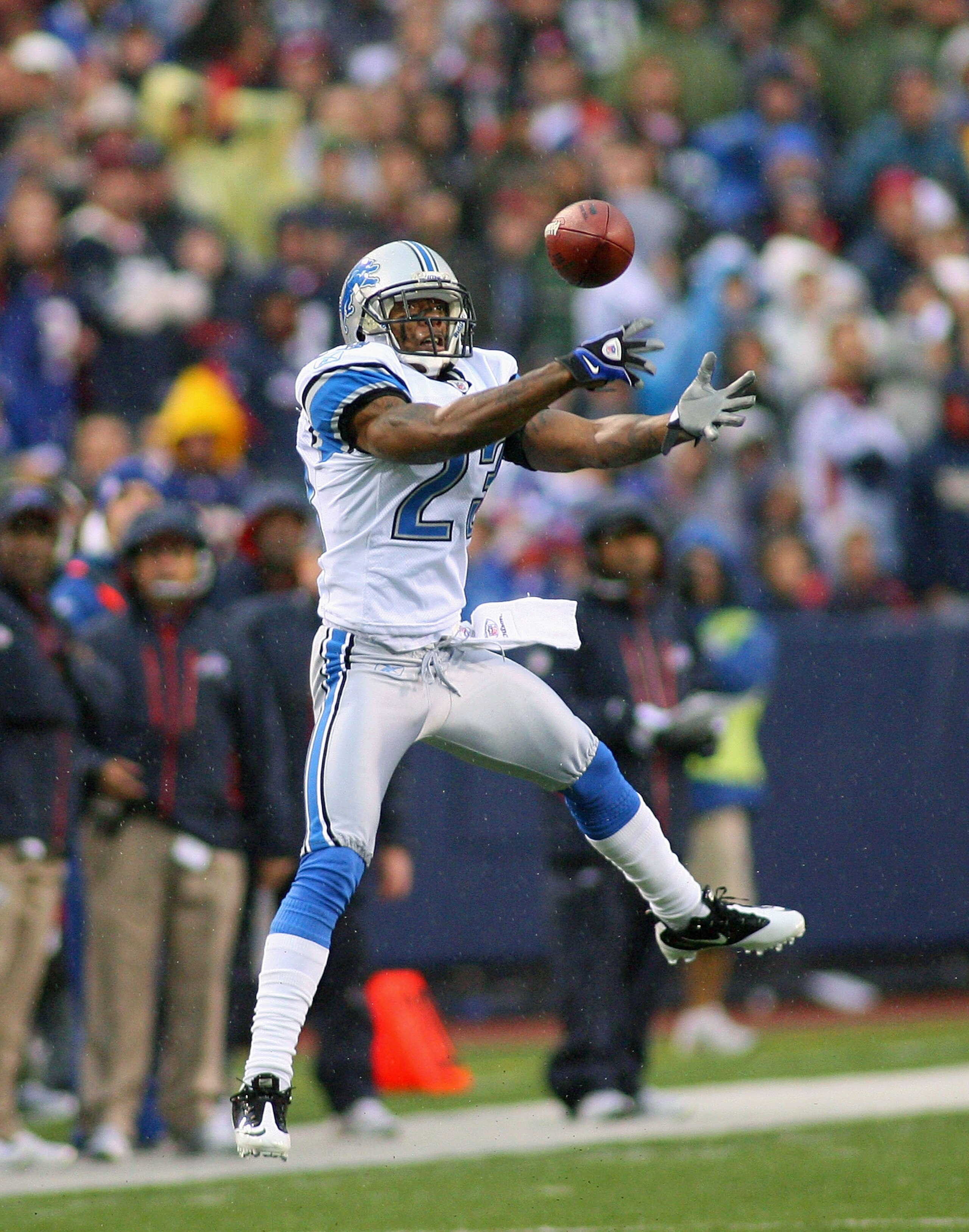 ORCHARD PARK, NY - NOVEMBER 14:  Chris Houston #23 of the Detroit Lions unsuccesfully tries to intercept a pass intended for Lee Evans #83 (not shown)of the Buffalo Bills  at Ralph Wilson Stadium on November 14, 2010 in Orchard Park, New York. Buffalo won