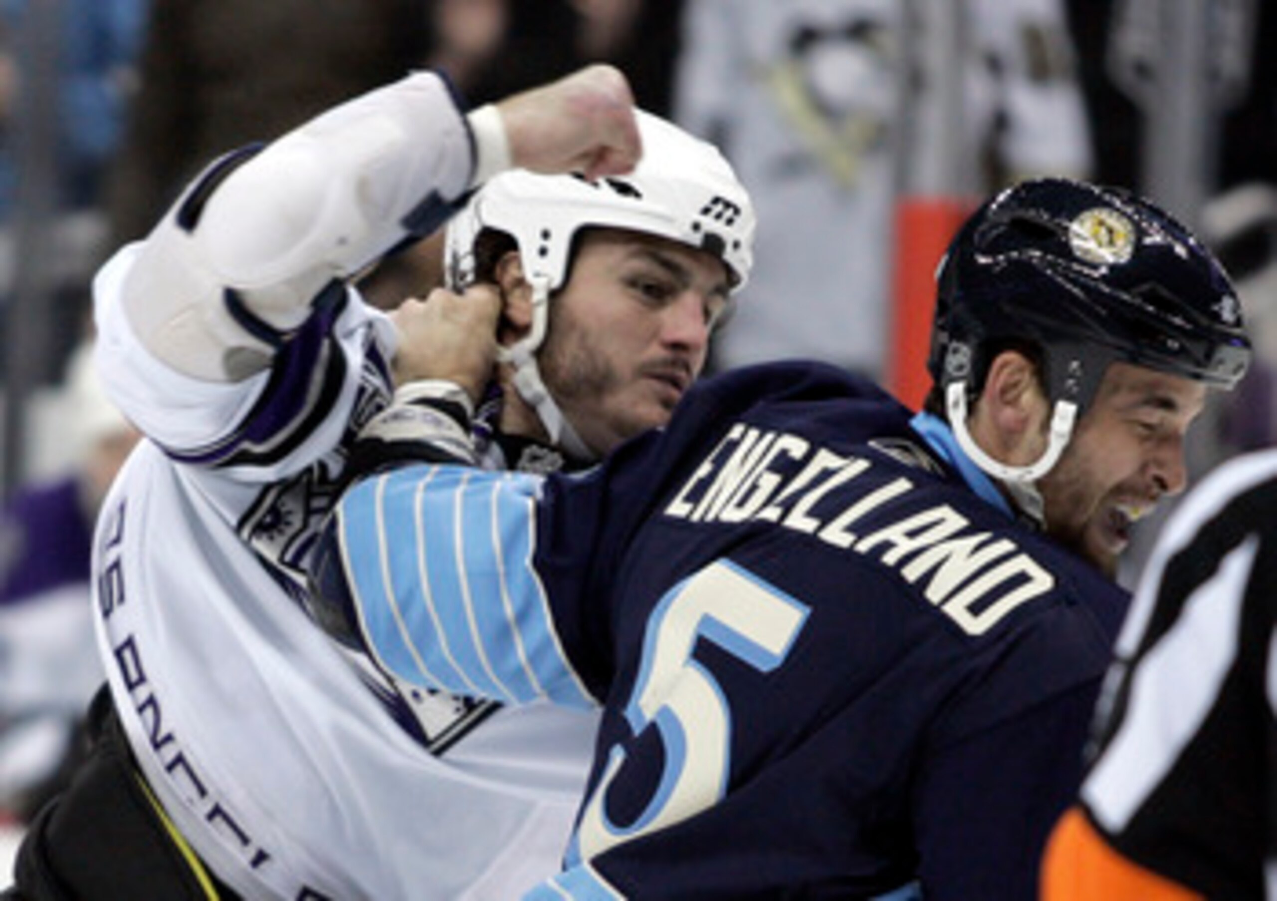 PITTSBURGH, PA - FEBRUARY 10:  Kevin Westgarth #19 of the Los Angeles Kings mixes it up with Deryk Engelland #5 of the Pittsburgh Penguins at Consol Energy Center on February 10, 2011 in Pittsburgh, Pennsylvania.  (Photo by Justin K. Aller/Getty Images)