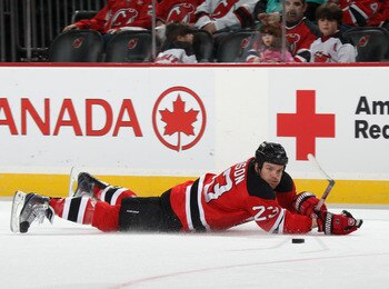 NEWARK, NJ - APRIL 10: David Clarkson #23 of the New Jersey Devils skates against the Boston Bruins at the Prudential Center on April 10, 2011 in Newark, New Jersey.  (Photo by Bruce Bennett/Getty Images)