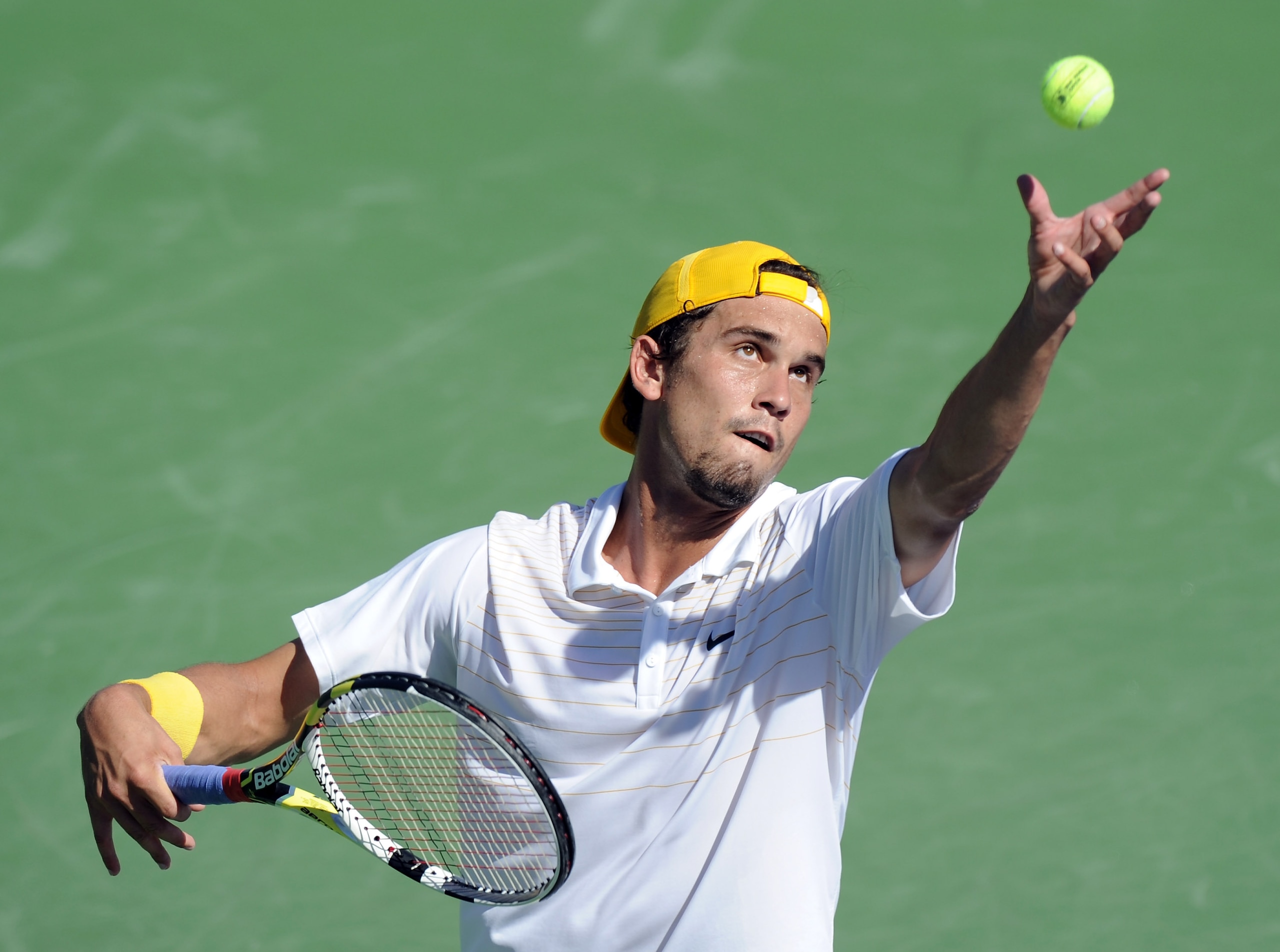 INDIAN WELLS, CA - MARCH 10:  Ryan Sweeting serves in his match against Marcel Granollers of Spain during the BNP Paribas Open at the Indian Wells Tennis Garden on March 10, 2011 in Indian Wells, California.  (Photo by Harry How/Getty Images)