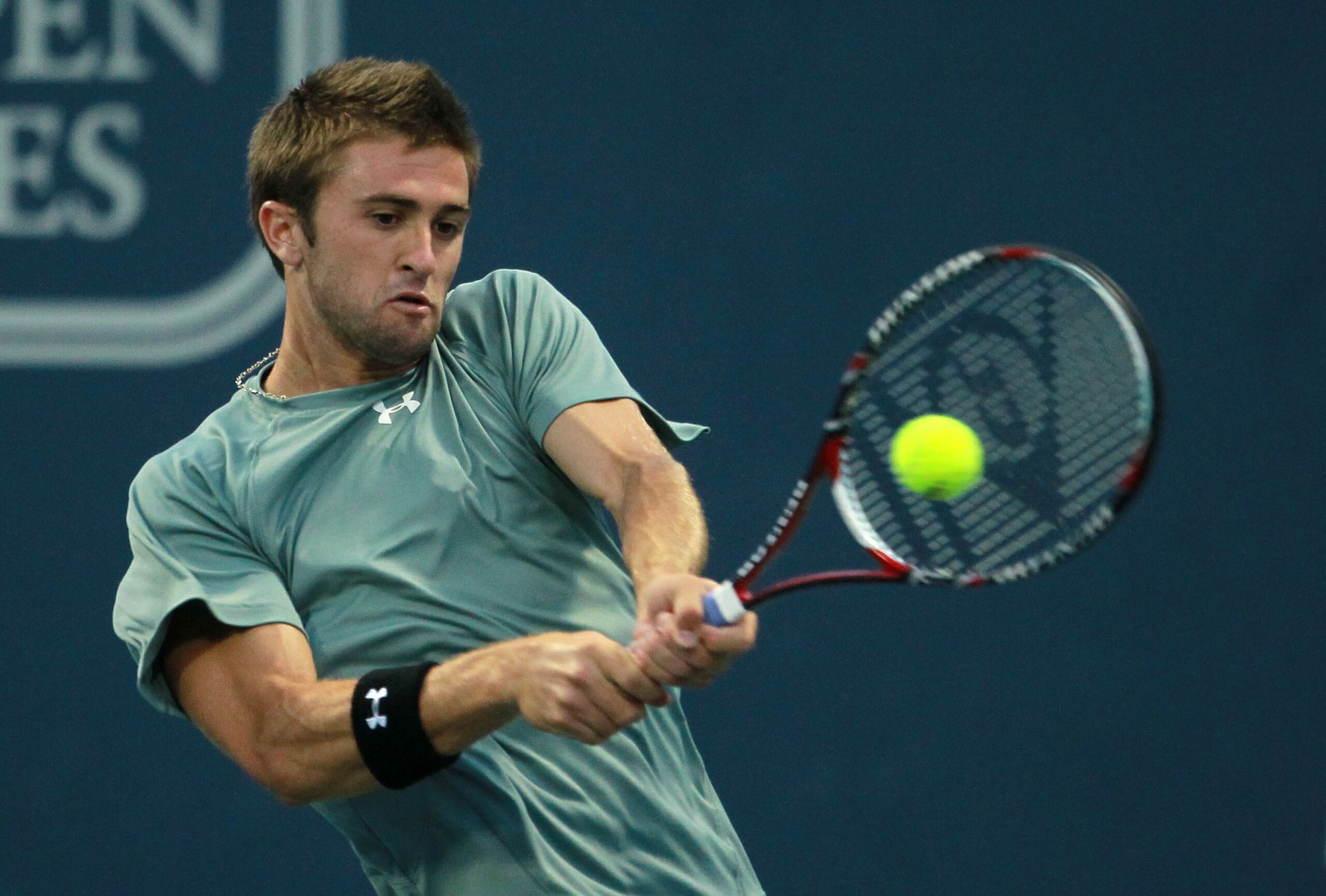 LOS ANGELES, CA - JULY 29:  Tim Smyczek returns a backhand to Andy Murray of Great Britain during the Farmers Classic at the Los Angeles Tennis Center - UCLA on July 29, 2010 in Los Angeles, California.  (Photo by Jeff Gross/Getty Images)
