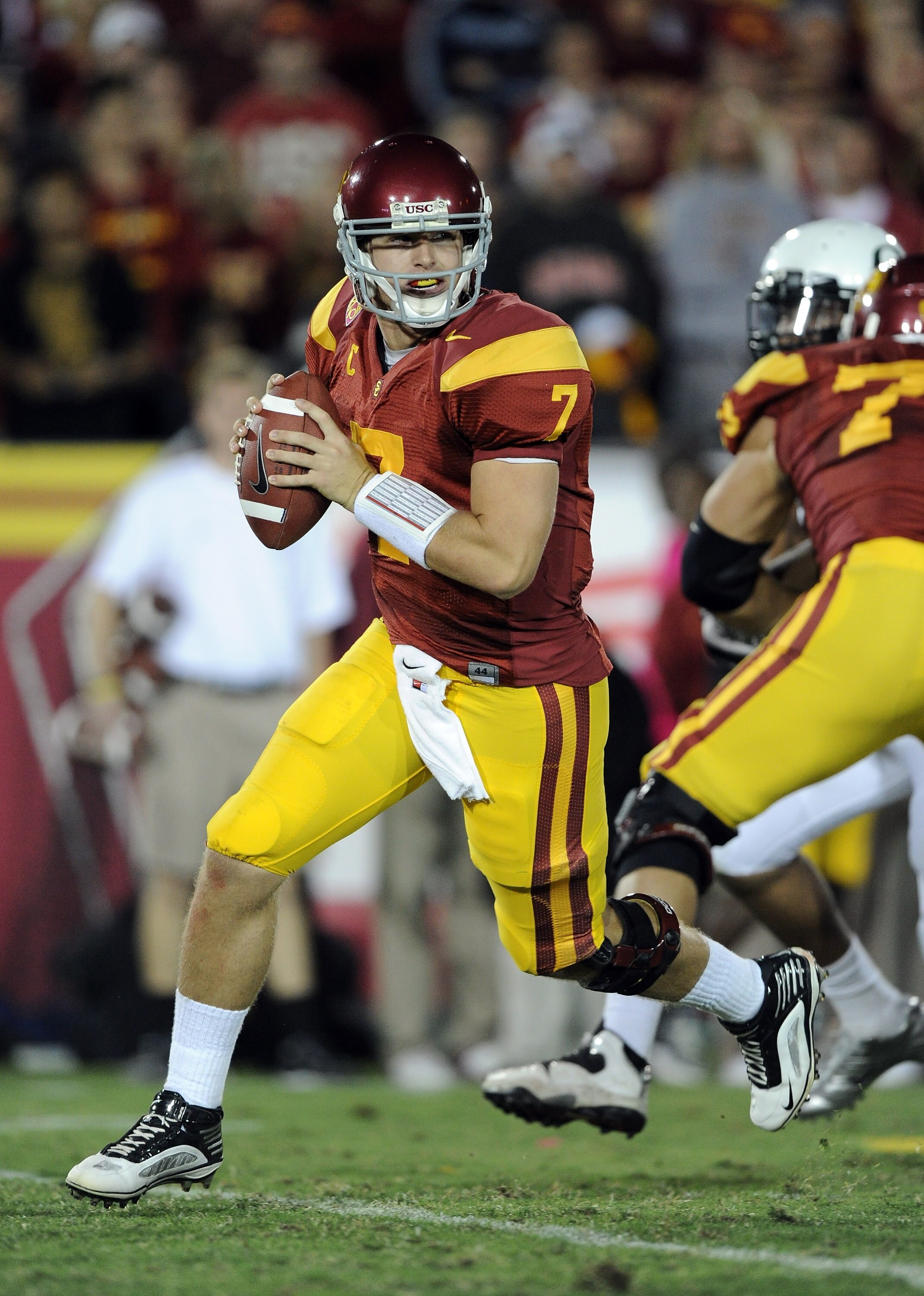 LOS ANGELES, CA - OCTOBER 30:  Matt Barkley #7 of the USC Trojans rolls out of the pocket against the Oregon Ducks at Los Angeles Memorial Coliseum on October 30, 2010 in Los Angeles, California.  (Photo by Harry How/Getty Images)