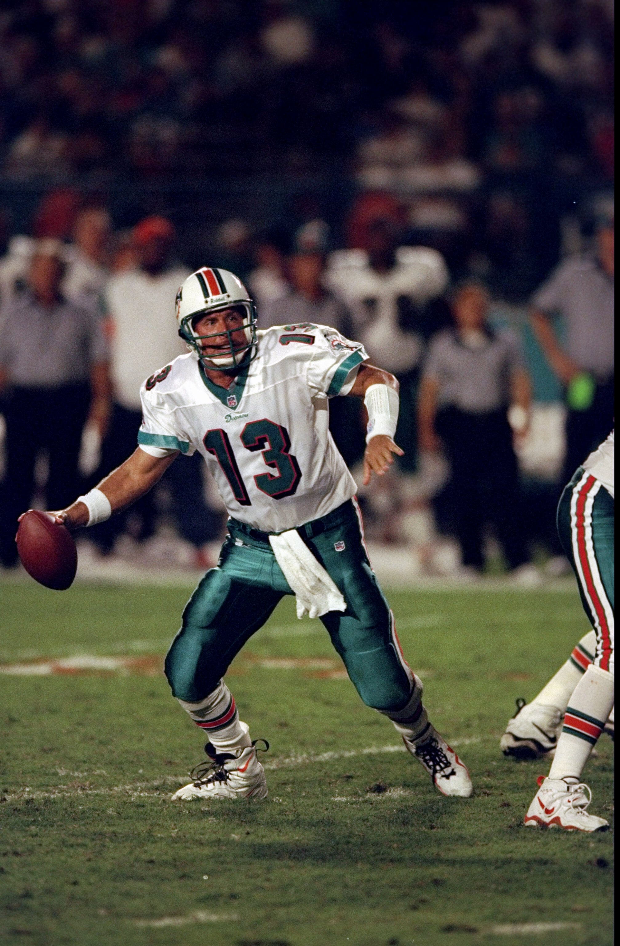 29 Nov 1998:  Quarterback Dan Marino #13 of the Miami Dolphins in action during the game against the New Orleans Saints at the MCI Center in Miami, Florida. The Dolphins defeated the Saints 30-10. Mandatory Credit: Vincent Laforet  /Allsport
