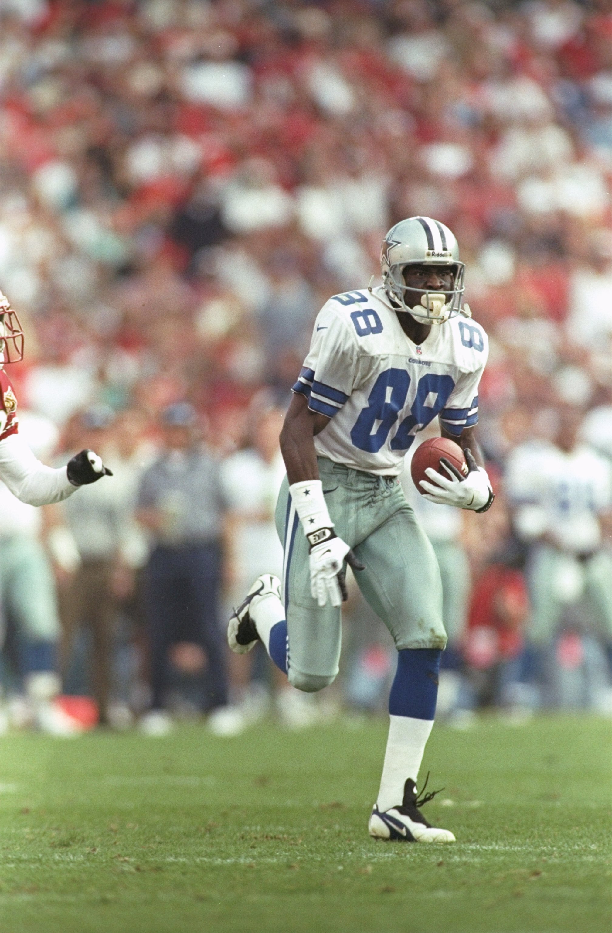 8 Dec 1996:  Wide receiver Michael Irvin of the Dallas Cowboys carries the football after making a catch during the Cowboys 10-6 win over the Arizona Cardinals at Sun Devil Stadium in Tempe, Arizona. Mandatory Credit: Otto Greule Jr.  /Allsport