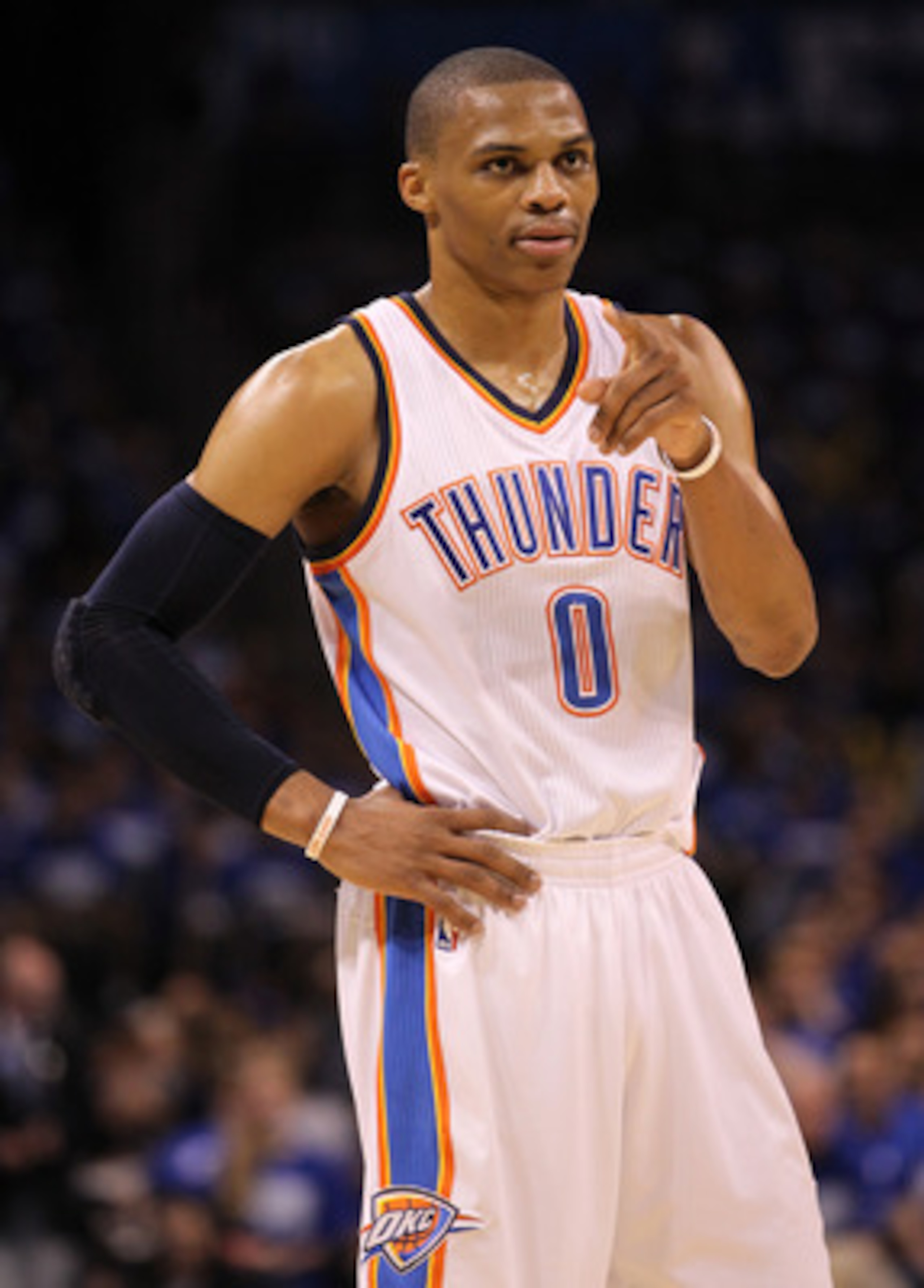 OKLAHOMA CITY, OK - MAY 21:  Russell Westbrook #0 of the Oklahoma City Thunder points in the third quarter while taking on the Dallas Mavericks in Game Three of the Western Conference Finals during the 2011 NBA Playoffs at Oklahoma City Arena on May 21, 2
