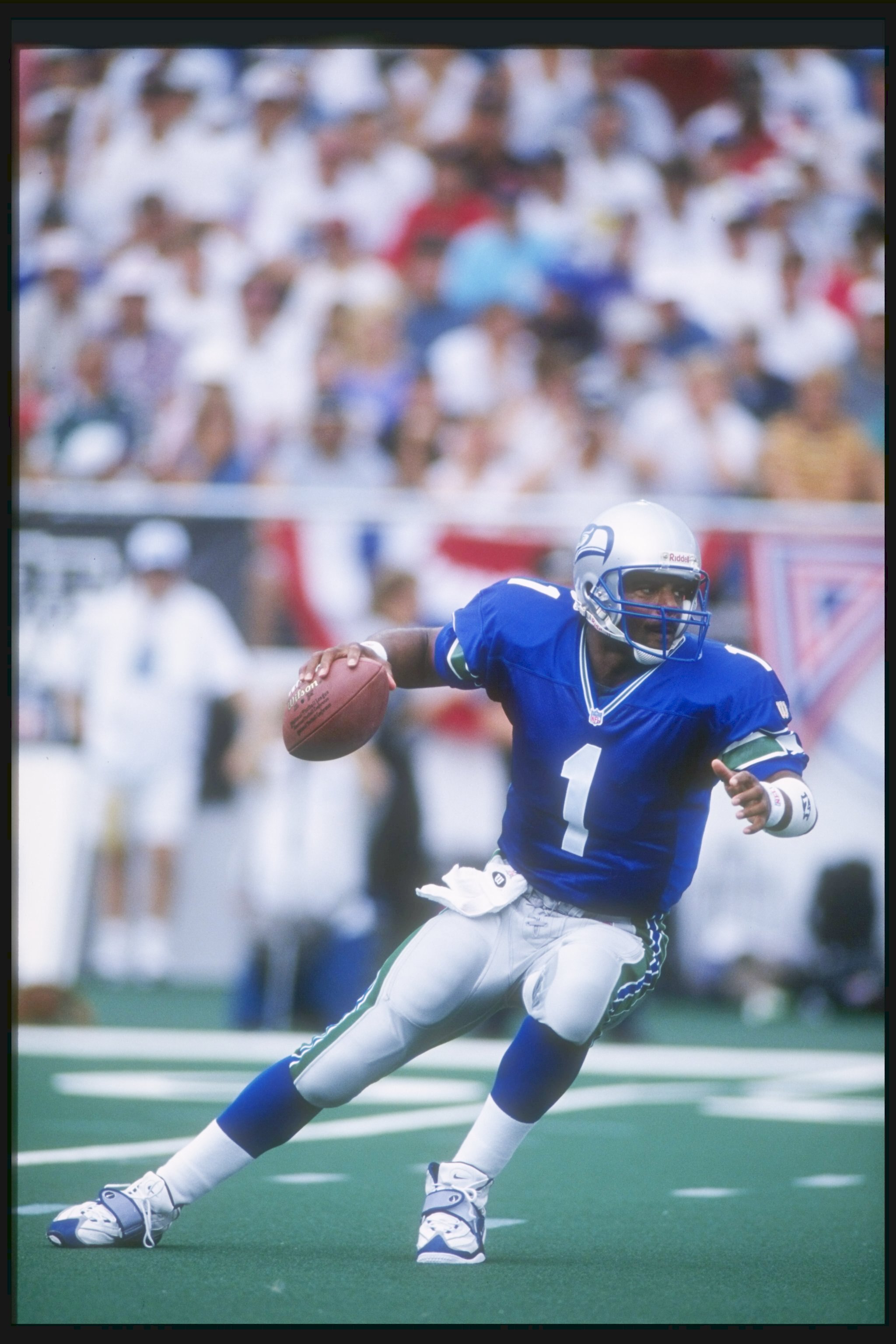 26 Jul 1997:  Quarterback Warren Moon of the Seattle Seahawks looks to pass the ball during the Hall of Fame game against the Minnesota Vikings at Fawcett Stadium in Canton, Ohio.  The Vikings won the game, 28-26. Mandatory Credit: Matthew Stockman  /Alls