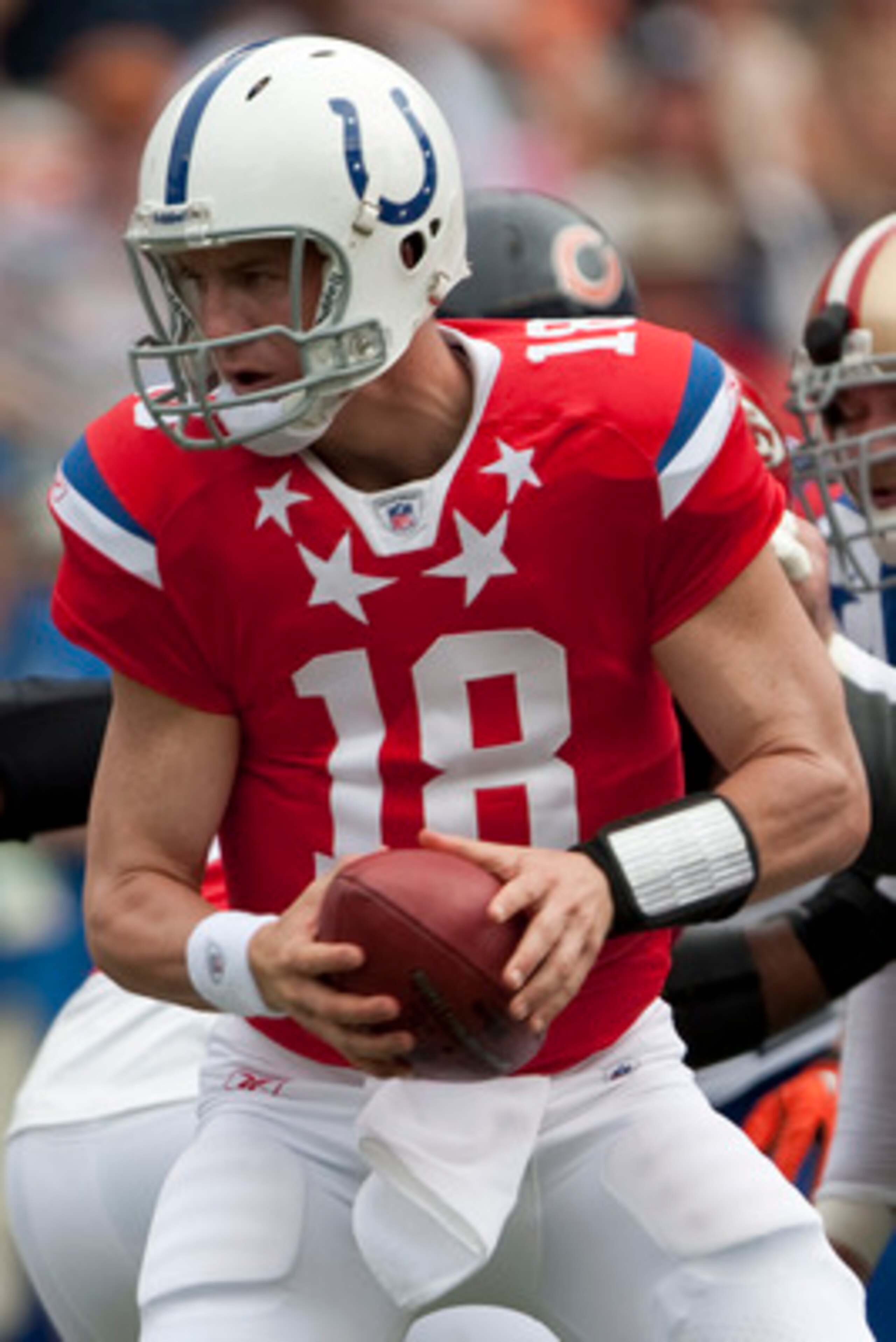 HONOLULU - JANUARY 30: Peyton Manning, #18 of the Indianapolis Colts, handles the ball during the 2011 NFL Pro Bowl at Aloha Stadium on January 30, 2011 in Honolulu, Hawaii. (Photo by Kent Nishimura/Getty Images) HONOLULU - JANUARY 30: Peyton Manning, #18 of the Indianapolis Colts, handles the ball during the 2011 NFL Pro Bowl at Aloha Stadium on January 30, 2011 in Honolulu, Hawaii. (Photo by Kent Nishimura/Getty Images)