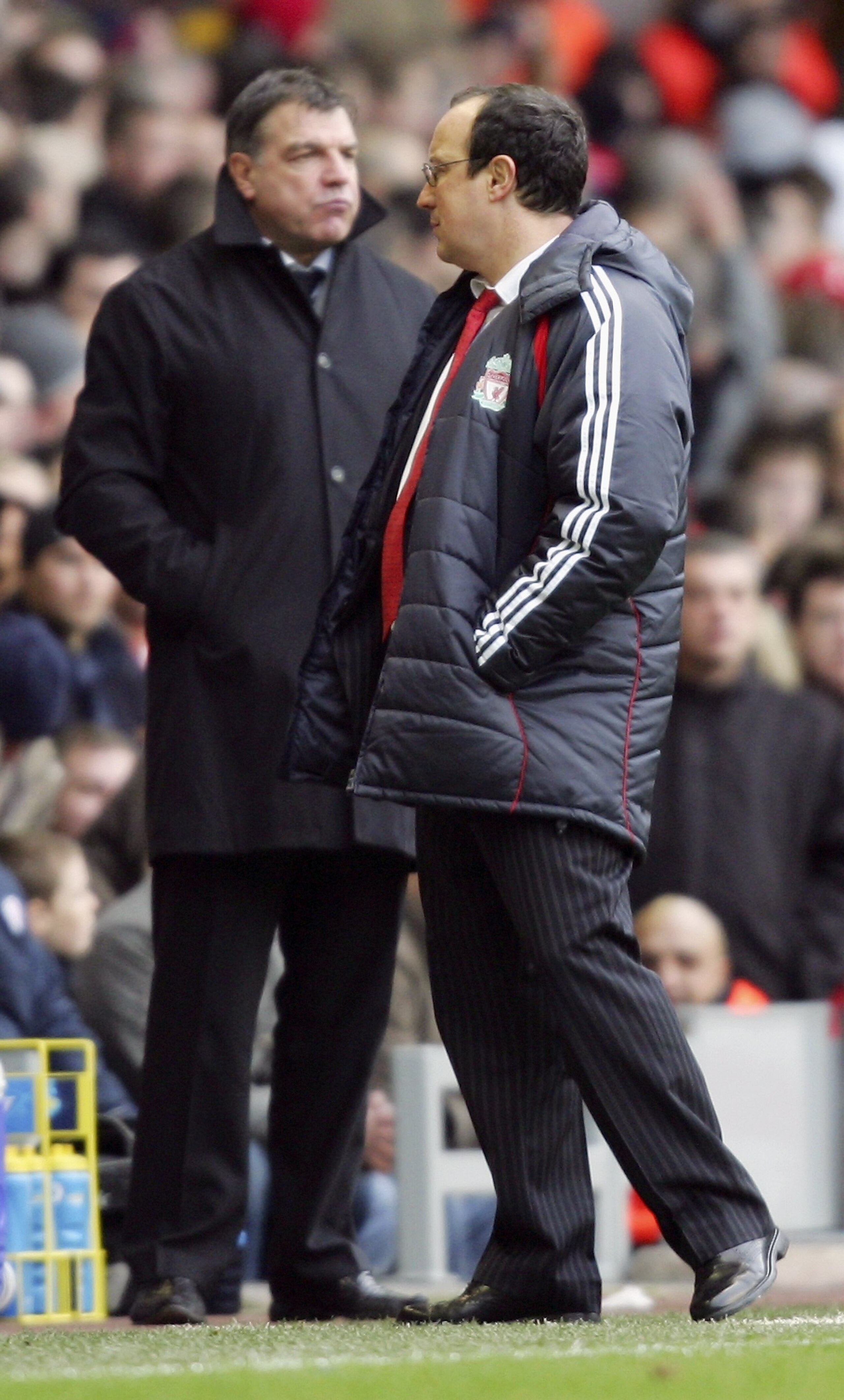 LIVERPOOL, UNITED KINGDOM - JANUARY 01:  Liverpool manager Rafael Benitez (R) and Sam Allardyce the manager of Bolton Wanderers watch the Barclays Premiership match between Liverpool and Bolton Wanderers at Anfield on January 1, 2007 in Liverpool, England